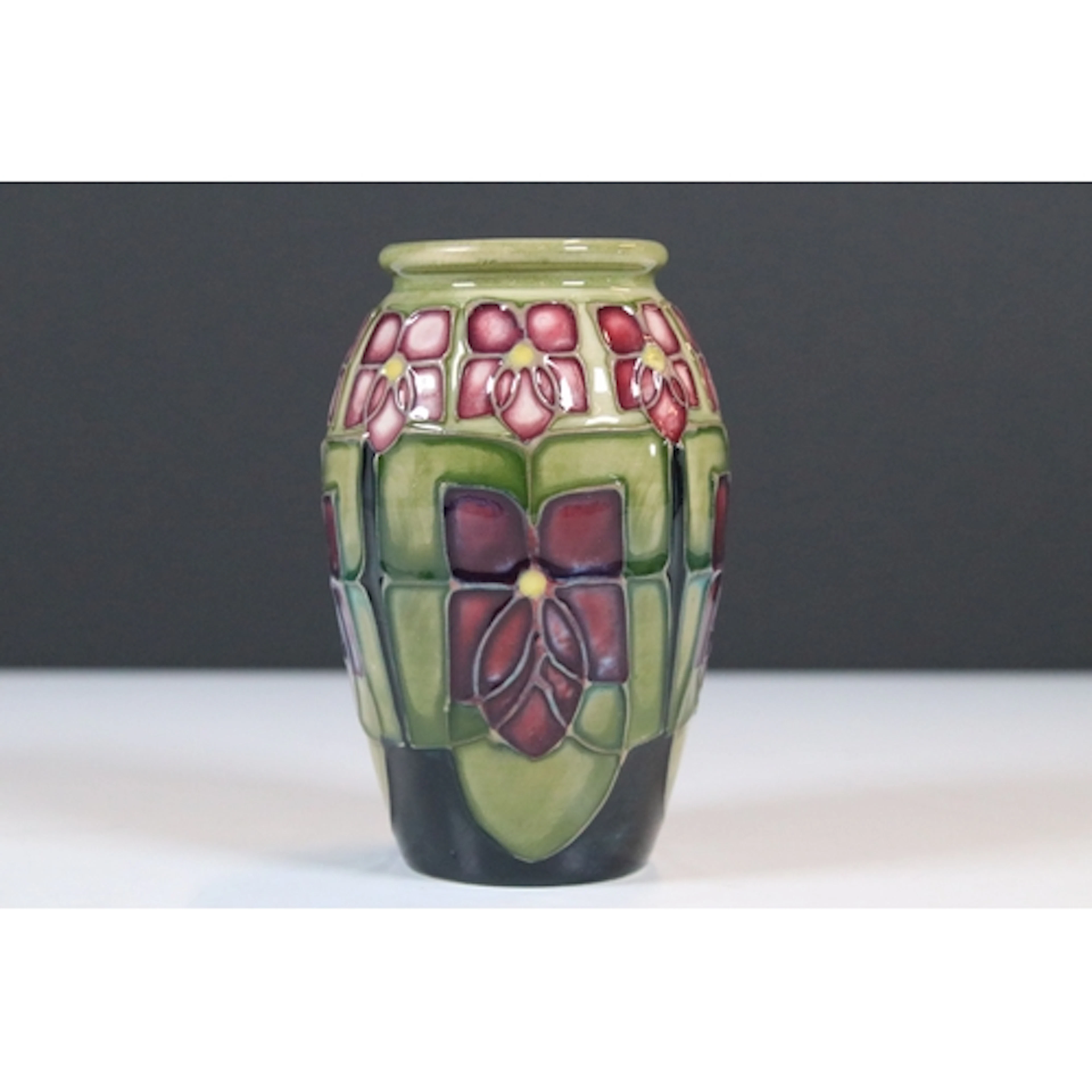 Moorcroft pottery 'Violet' pattern vase, of ovoid form, desi...