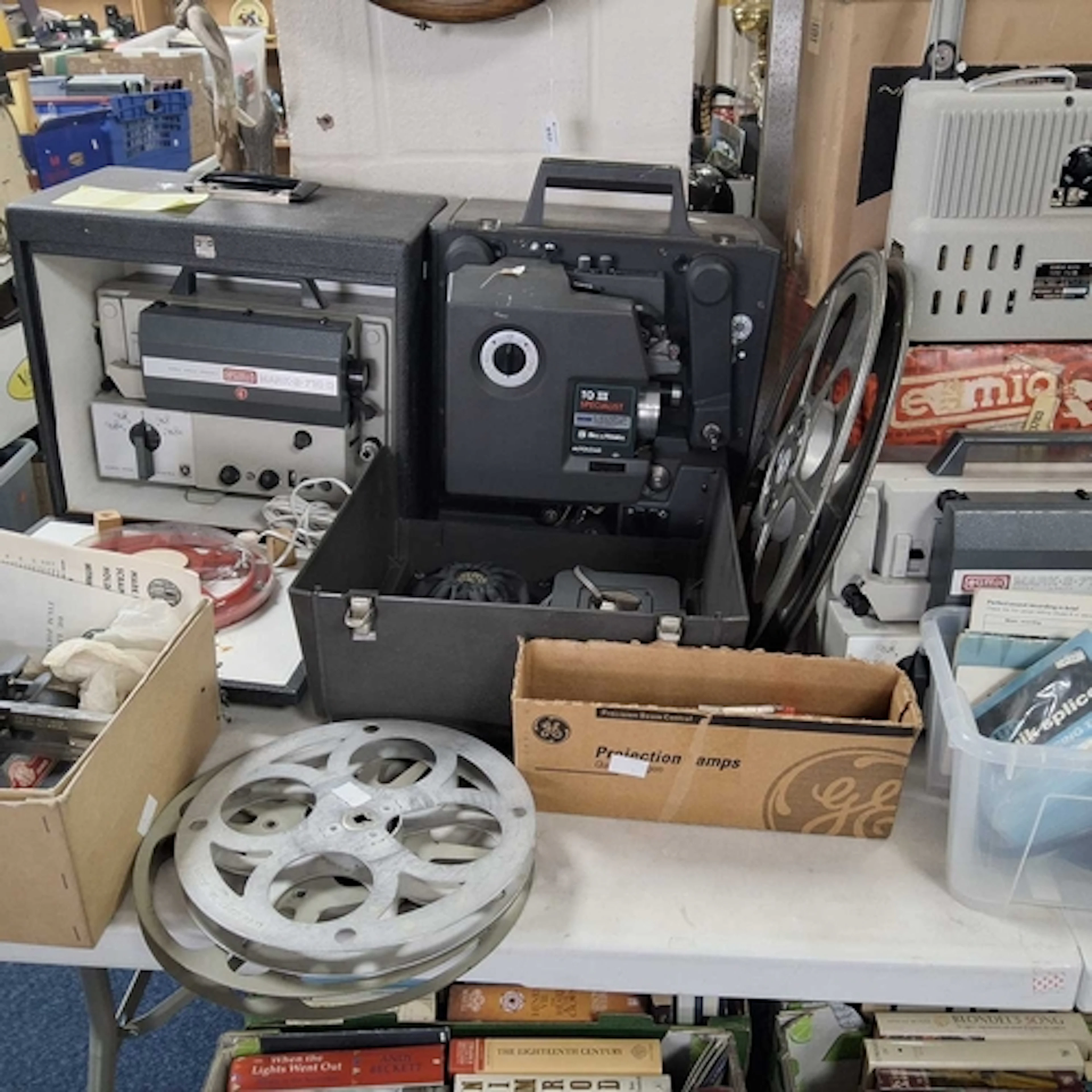 A GROUP OF PROJECTORS, ACCESSORIES AND A SPLICER comprising ...