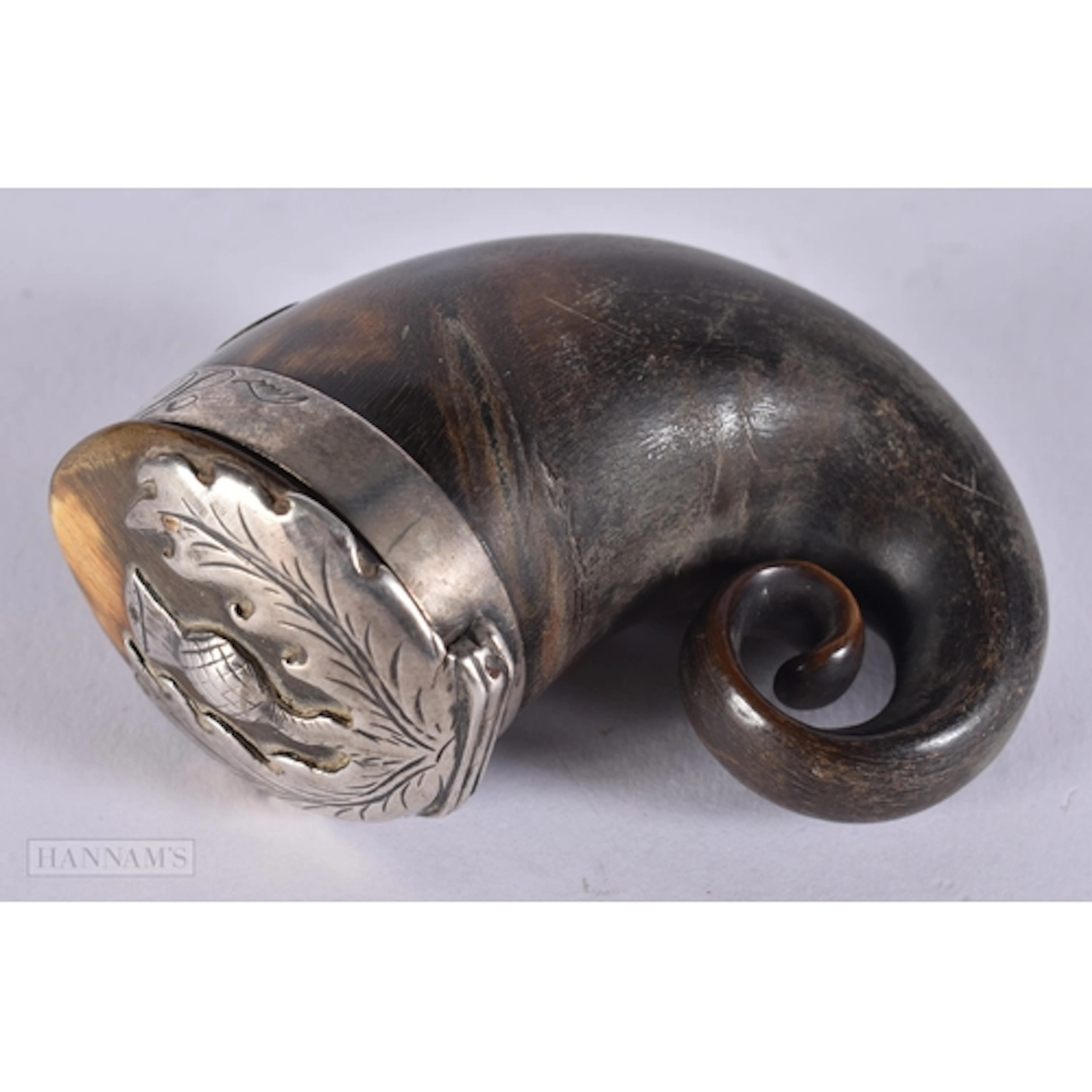 AN ANTIQUE SCOTTISH WHITE METAL HORN SNUFF MULL. 60.8 grams....