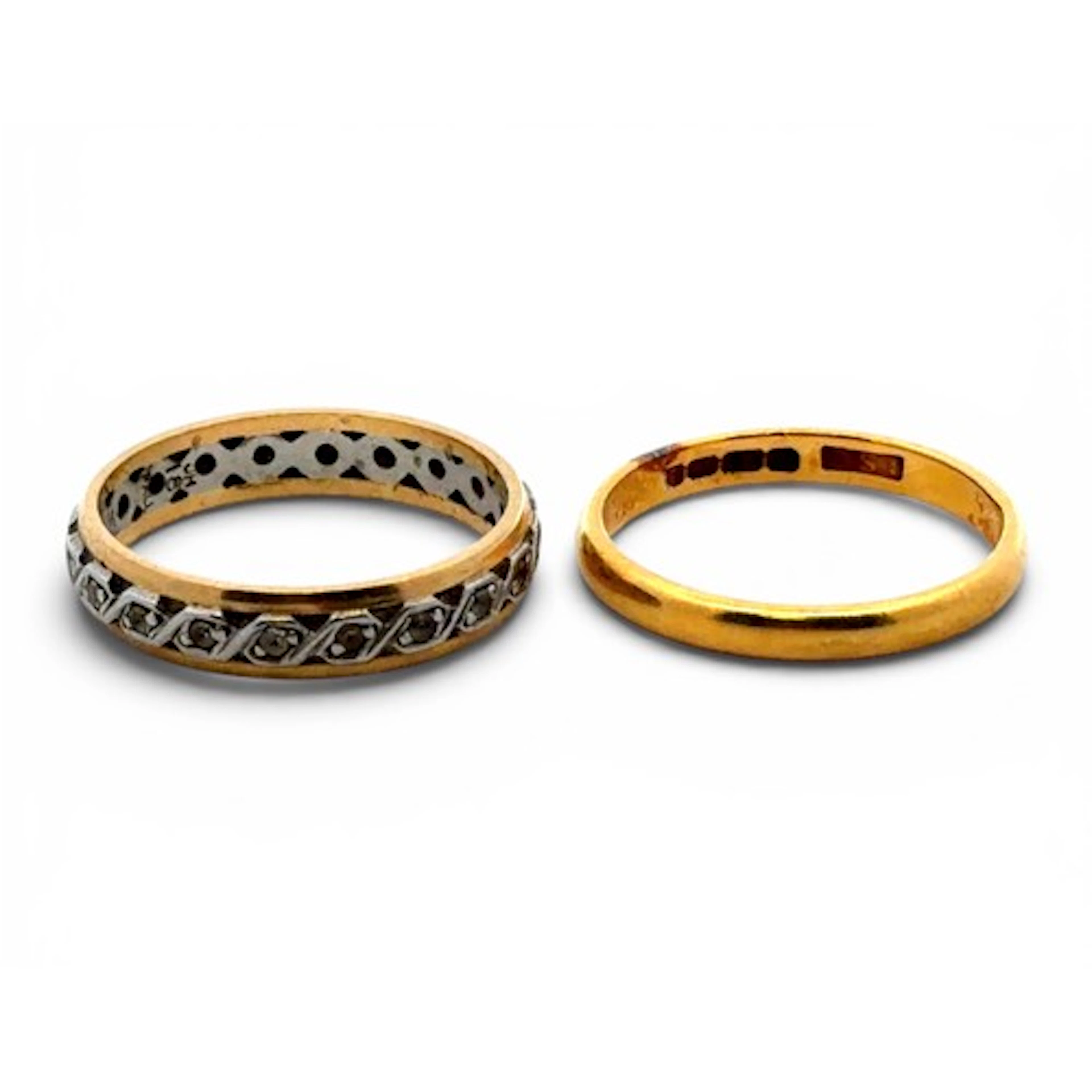 Two gold rings - a 22ct gold band size M 1/2 2.8g, and a bi...