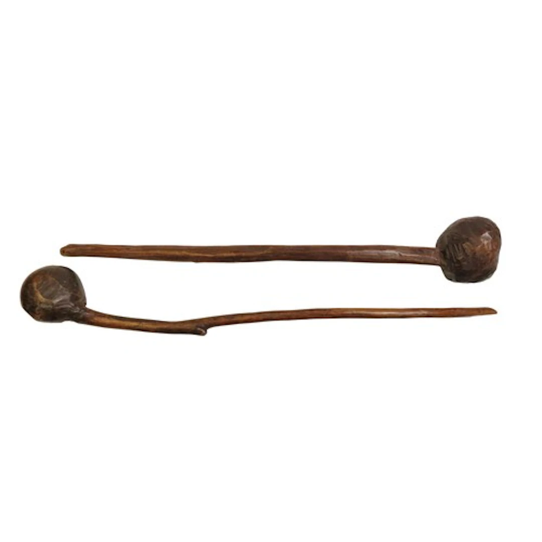 A KNOBKERRIE of roughly finished form and another similar, p...