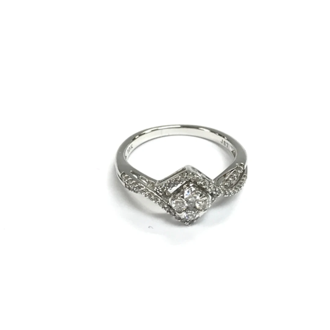 A 10ct white gold diamond cluster ring. Size L 1/2.