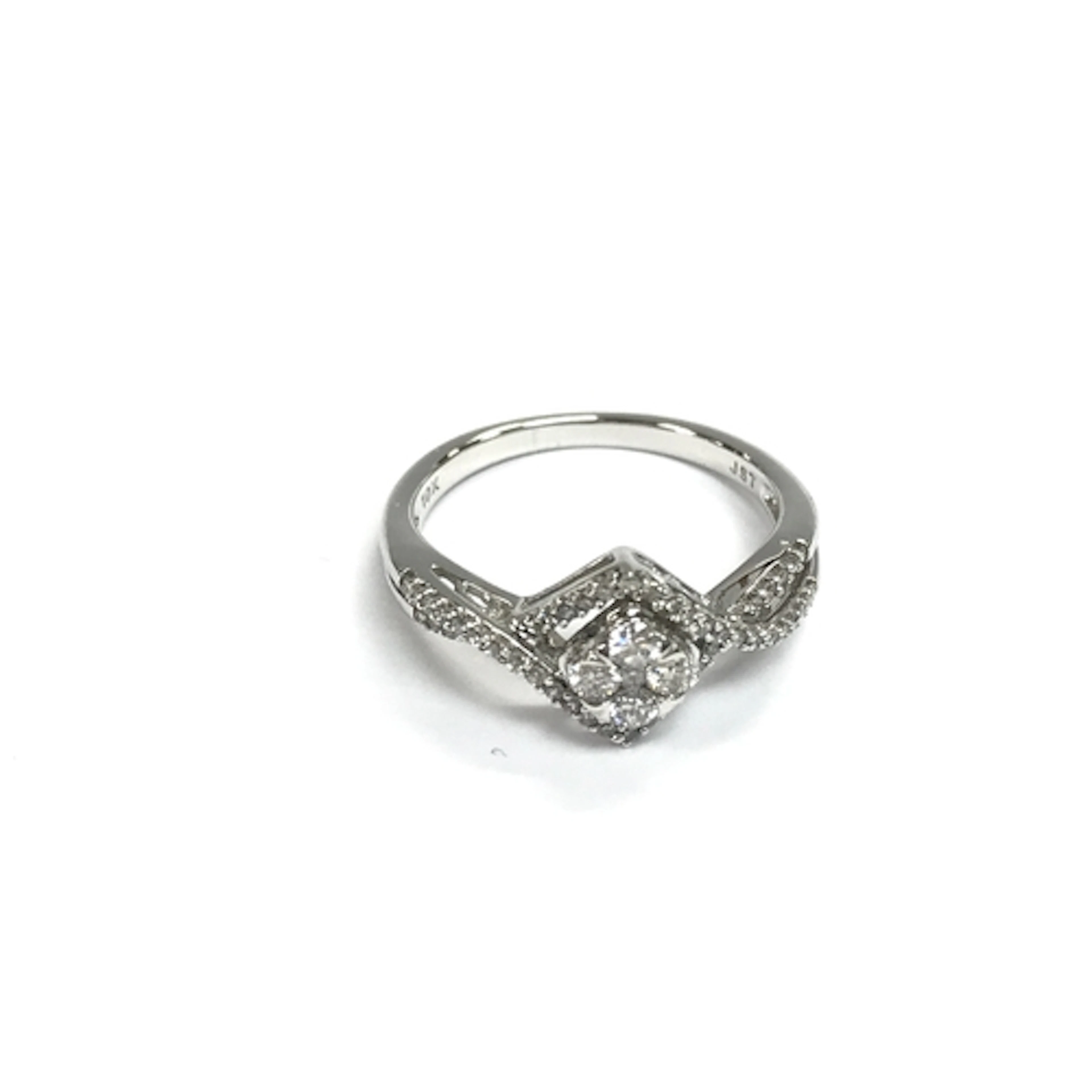 A 10ct white gold diamond cluster ring. Size L 1/2.