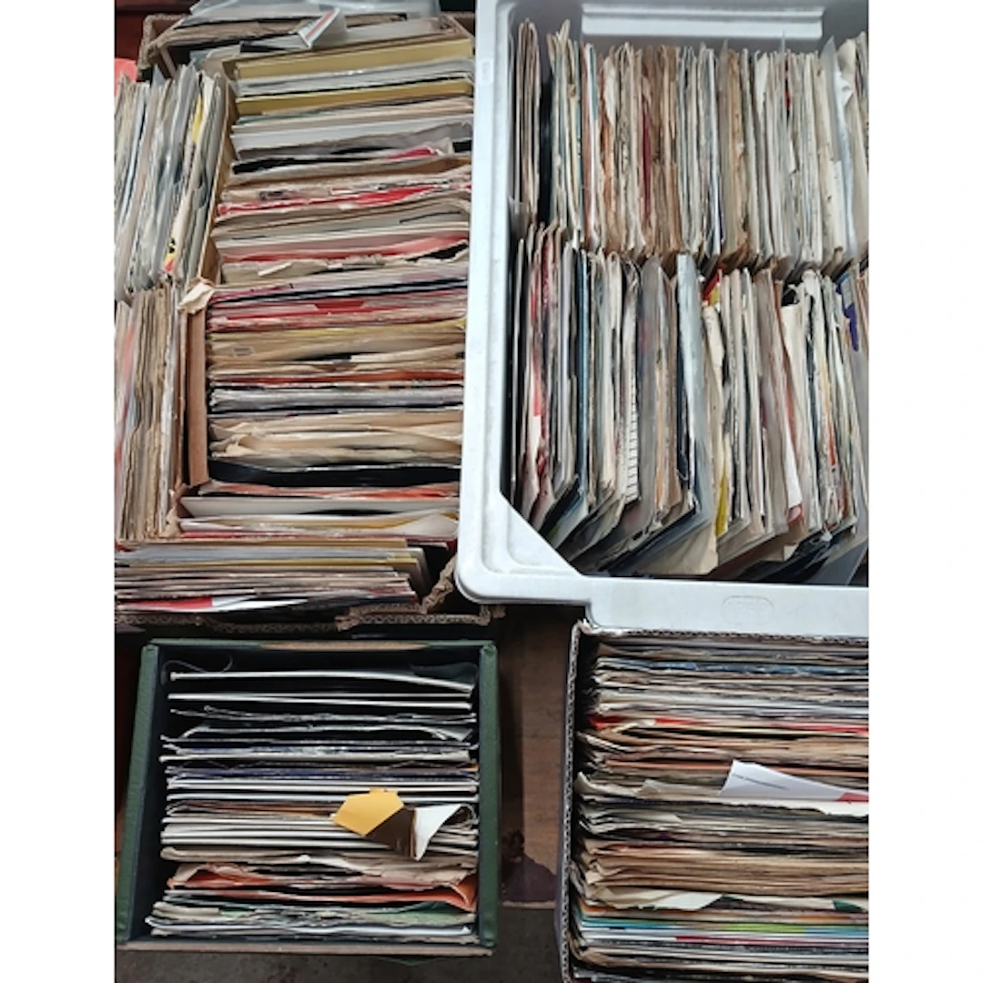 Four boxes of assorted 7" vinyl singles, unchecked, sold as ...
