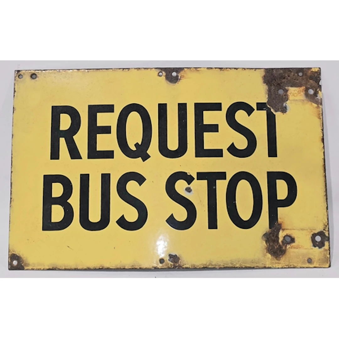 A vintage Bournemouth "Request Bus Stop" yellow and black en...
