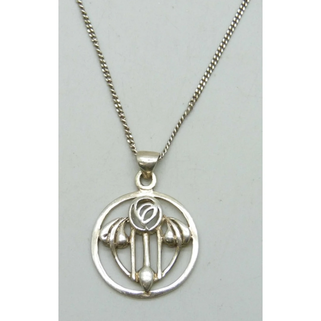 A silver Arts and Crafts style pendant, 3cm including bail, ...