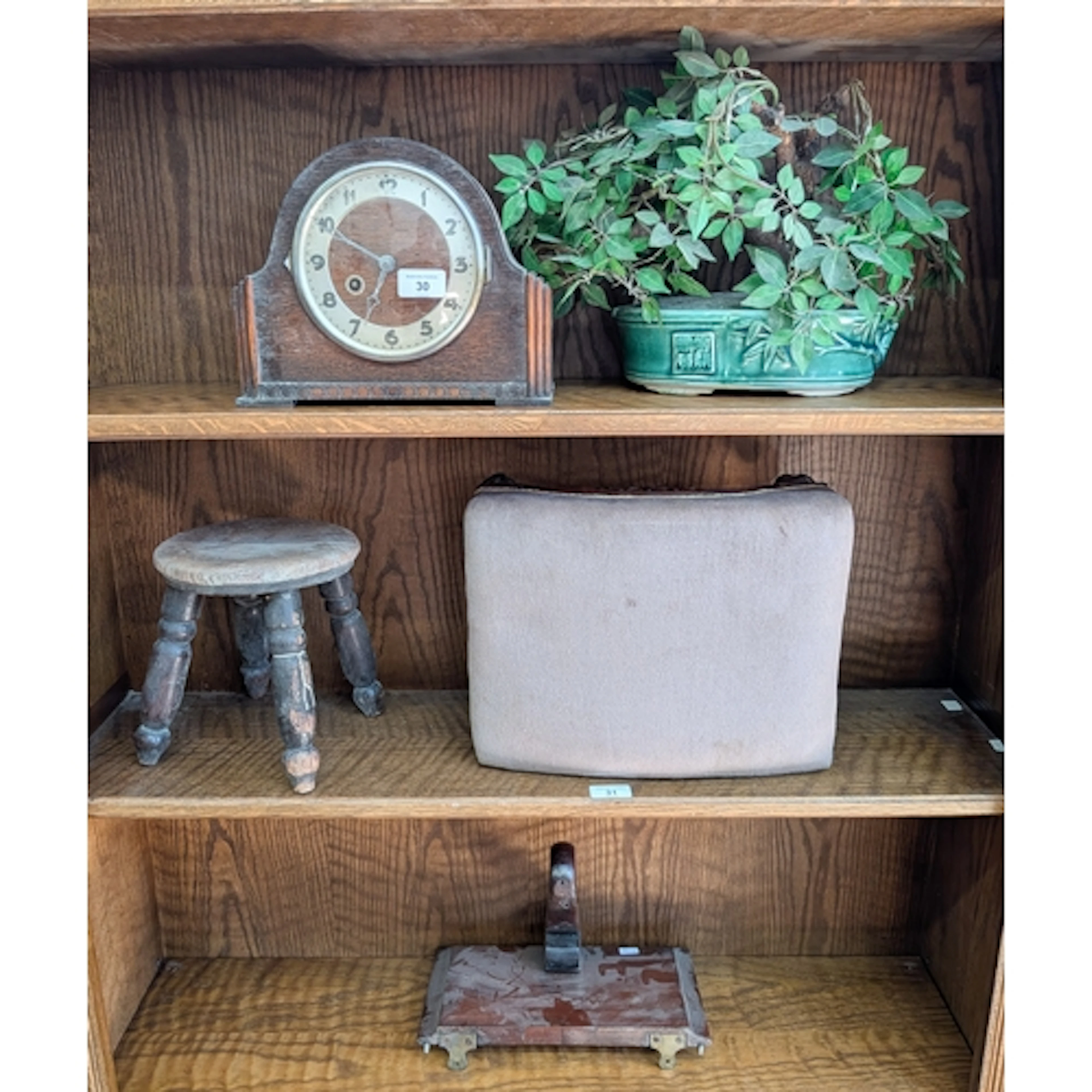 A mantel clock together with a footstool, one other stool, a...