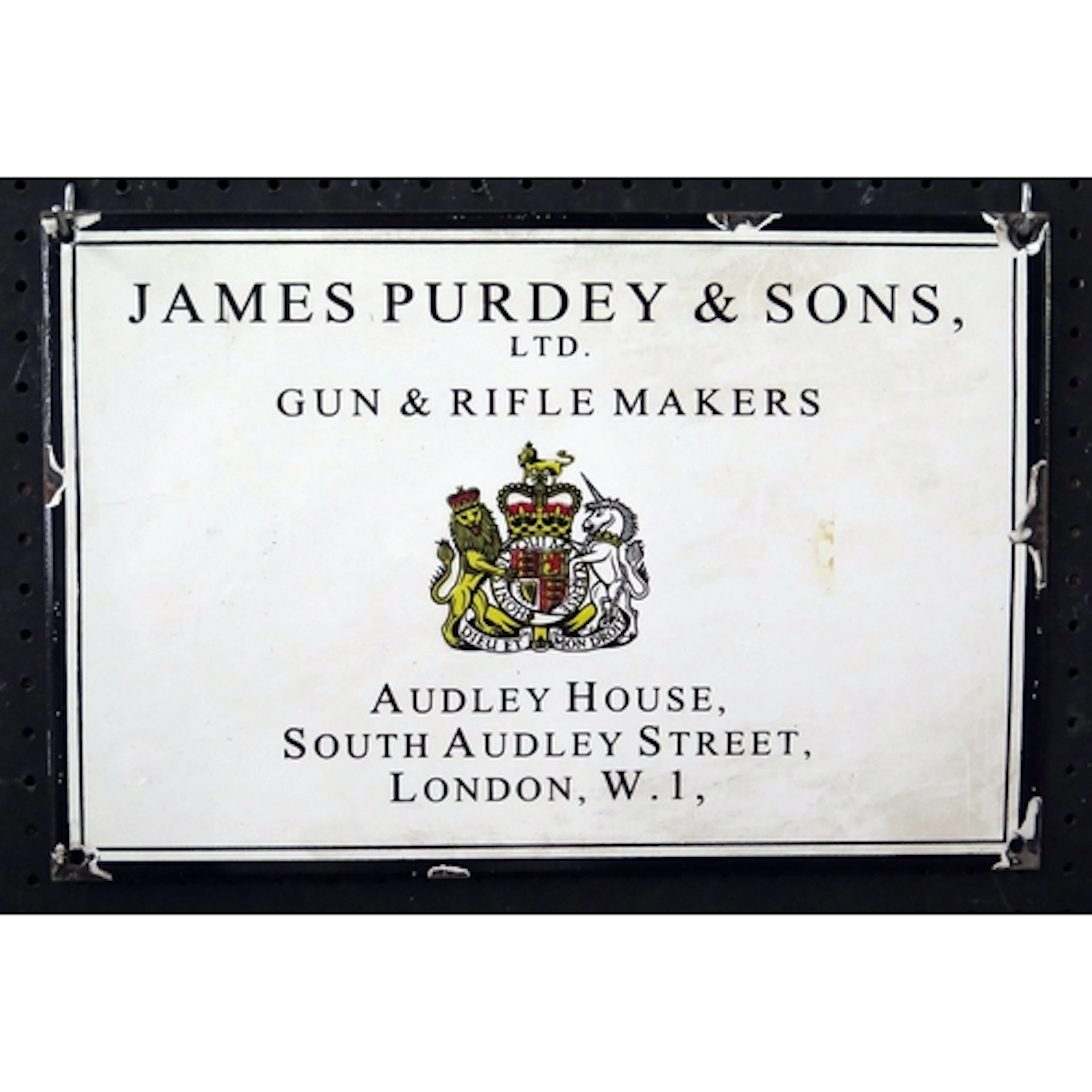 James Purdey & Sons, Gun & Rifle Makers, a reproduction enam...