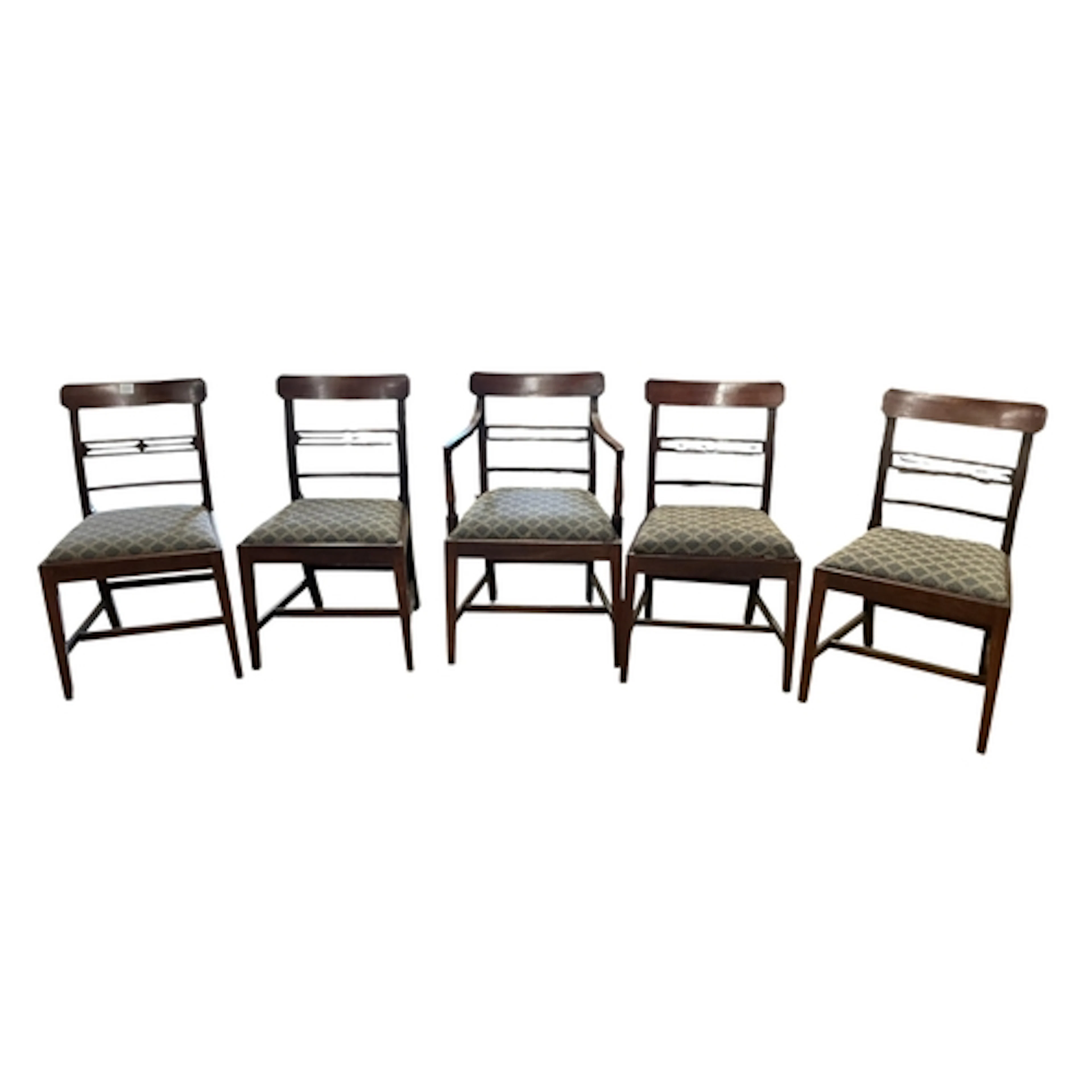 A set of six Regency mahogany dining chairs including an elb...