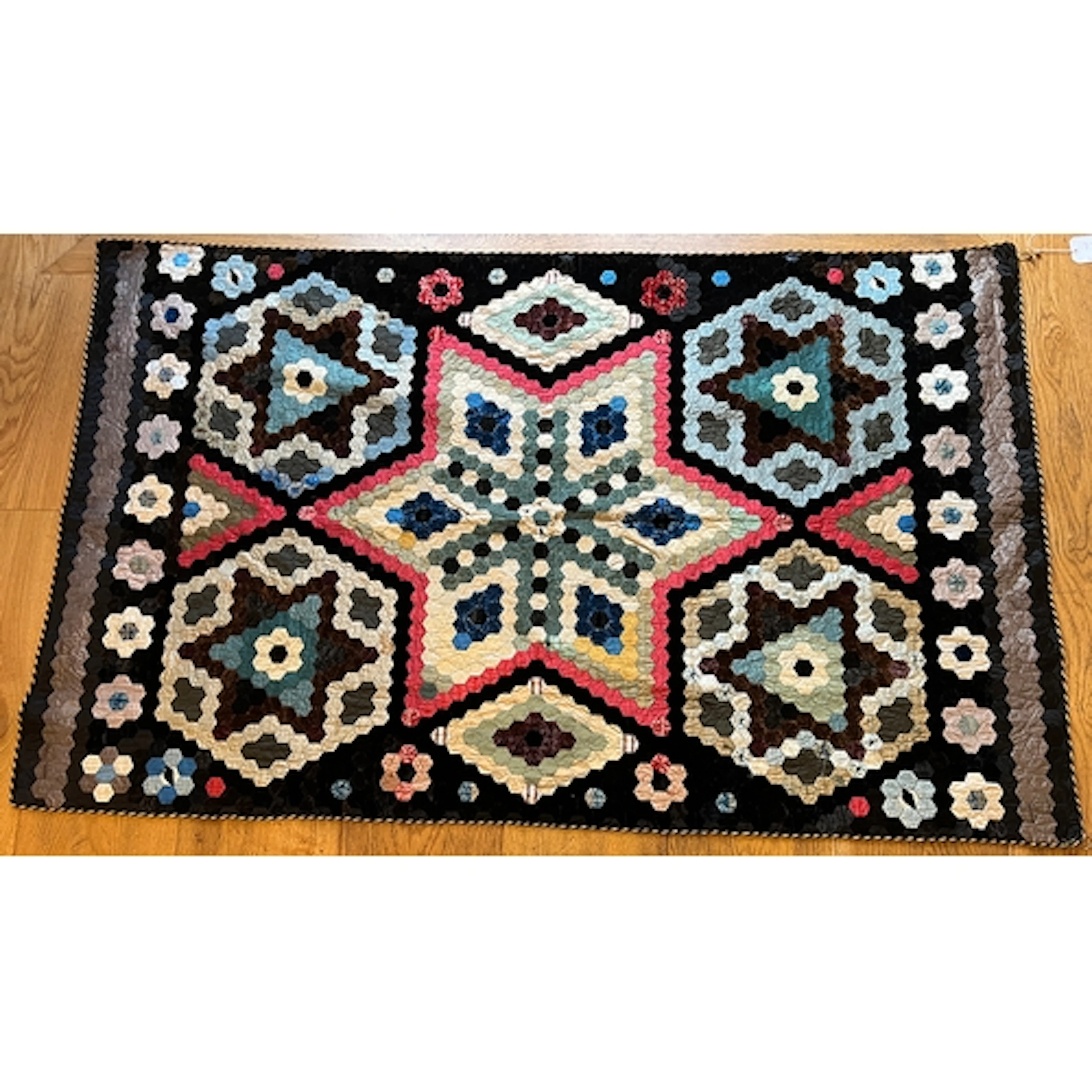 An antique silk quilt with hexagonal patchwork pattern, 196x...