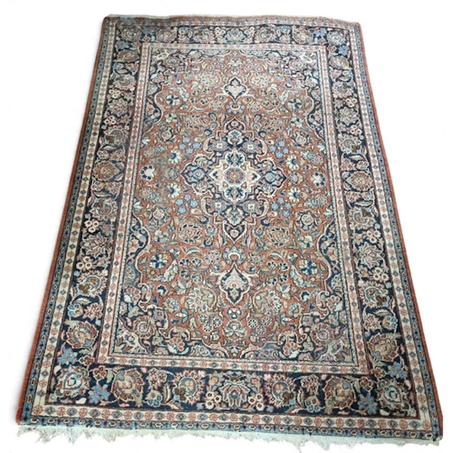 A Persian Rug with blue ground central medallion design and ...