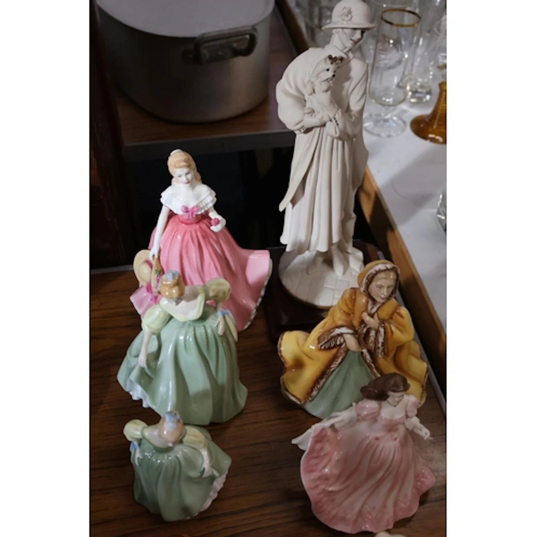Four Royal Doulton figurines to include Fair Lady, Fair Maid...