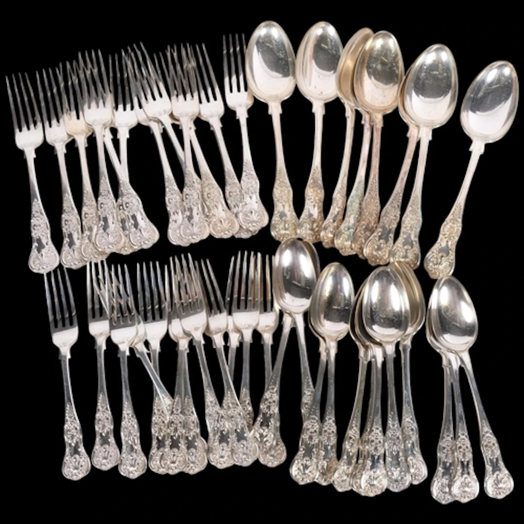 A variety of silver plated King's pattern flatware