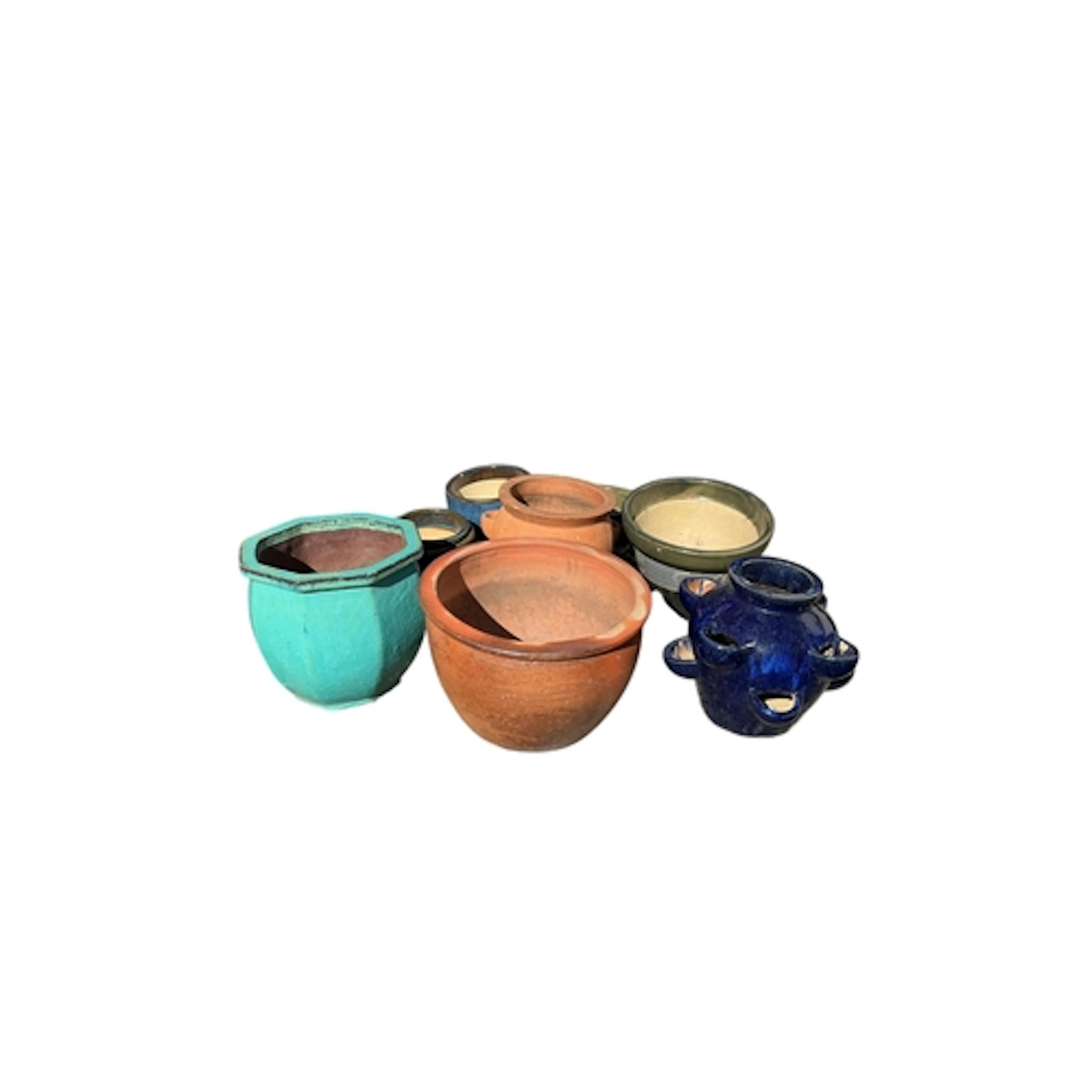 Ten various glazed and terracotta garden pots