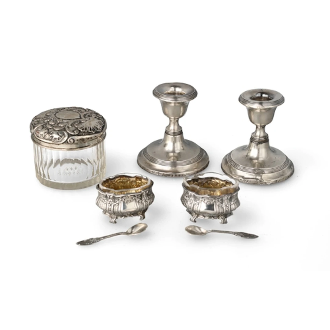 A PAIR OF FRENCH SILVER SALT CELLARS IN THE FORM OF MINIATUR...