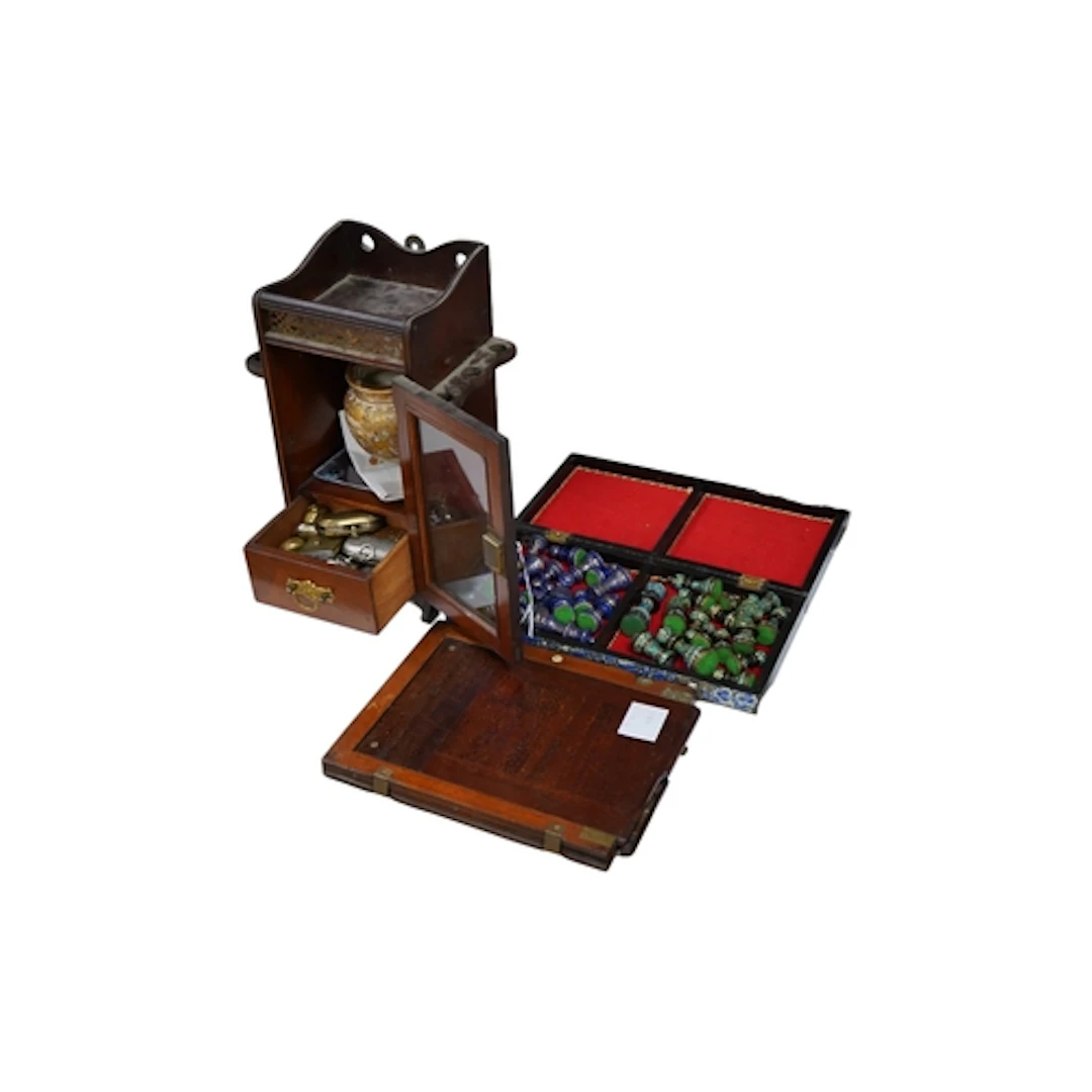 A late Victorian mahogany smoker's cabinet containing a coll...