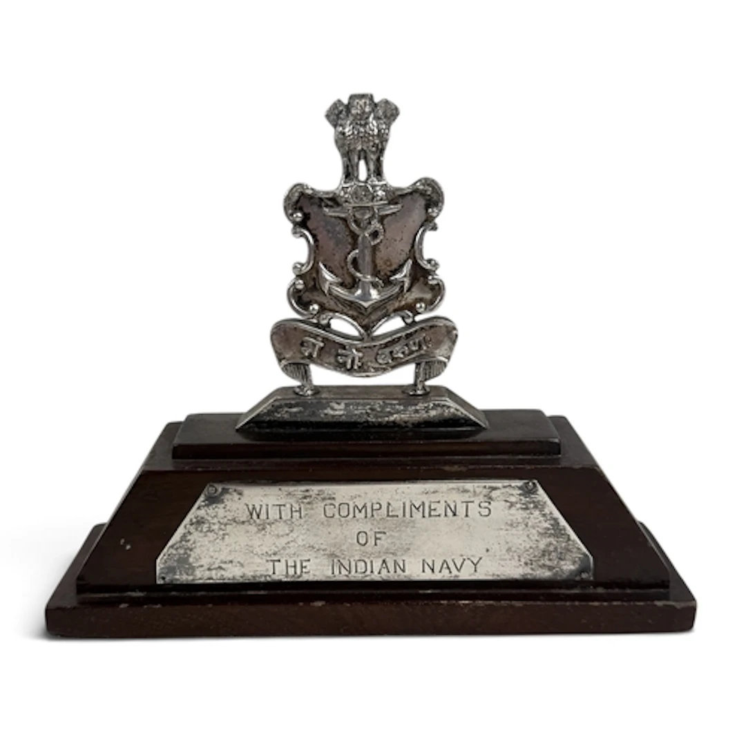 AN INDIAN SILVER NAVAL COAT OF ARMS Mounted on wooden stand ...