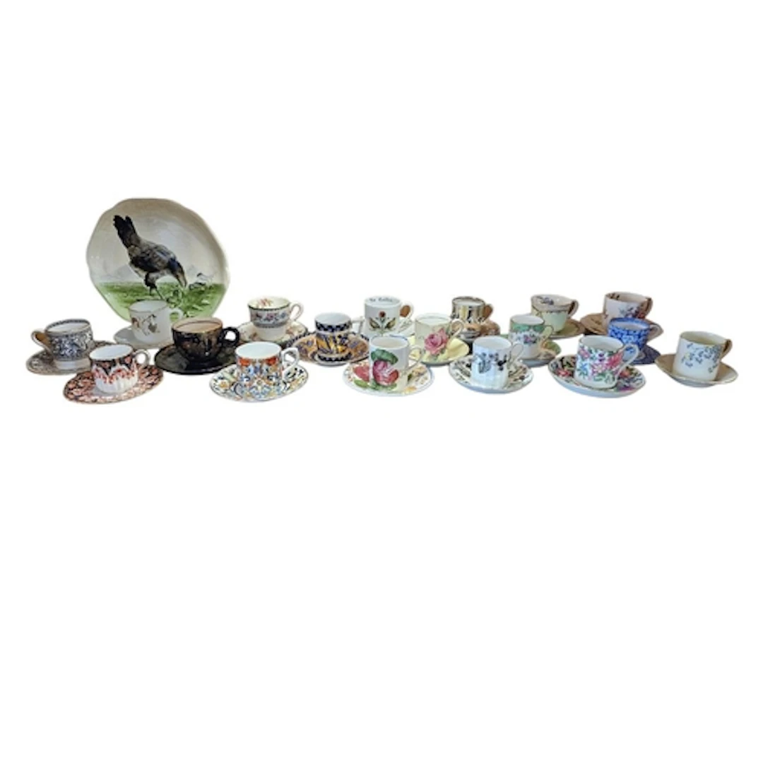 A COLLECTION OF EIGHTEEN VINTAGE PORCELAIN TASSE/COFFEE CUPS...