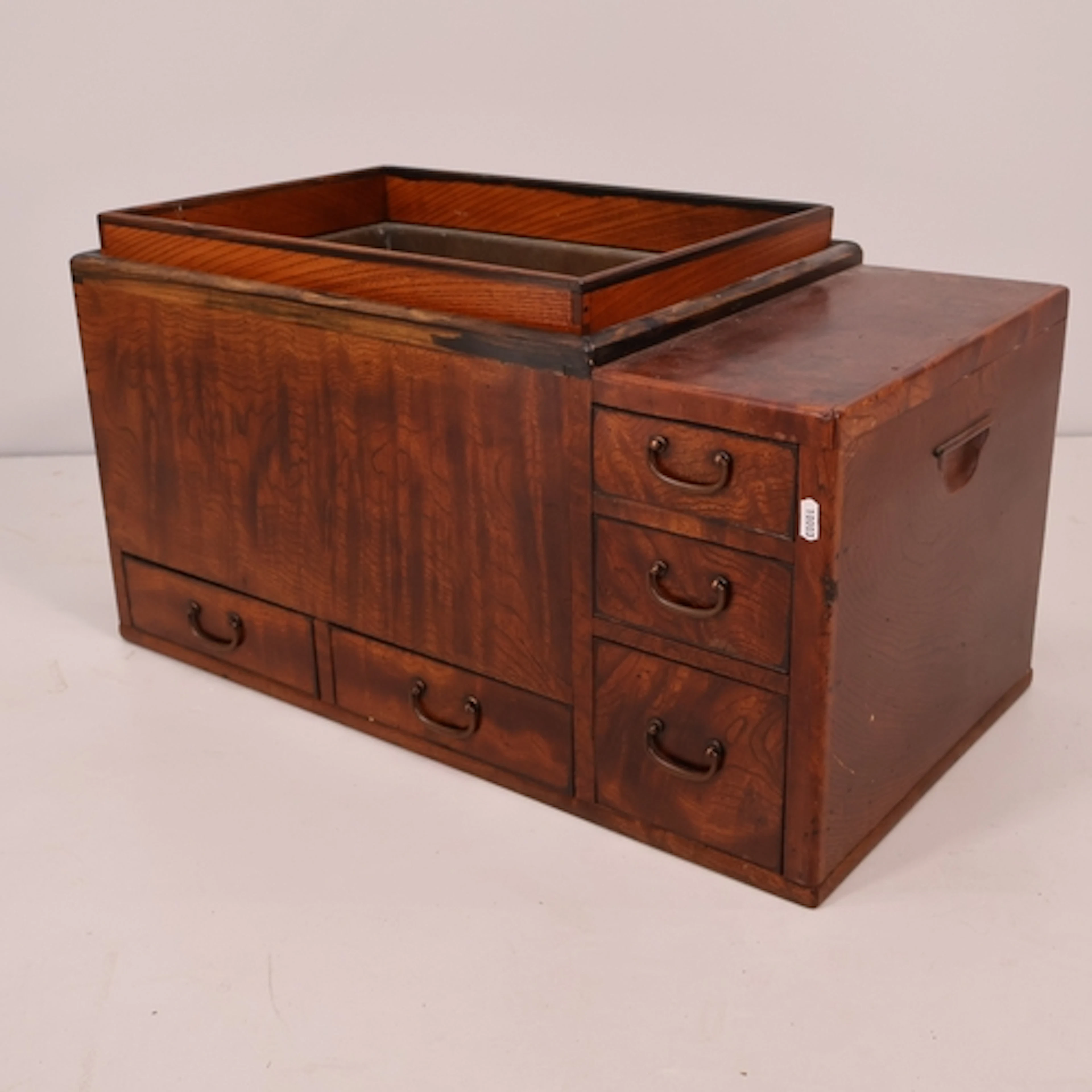 An antique elm veneered Japanese Hibachi, W72cm, H38cm, D39c...