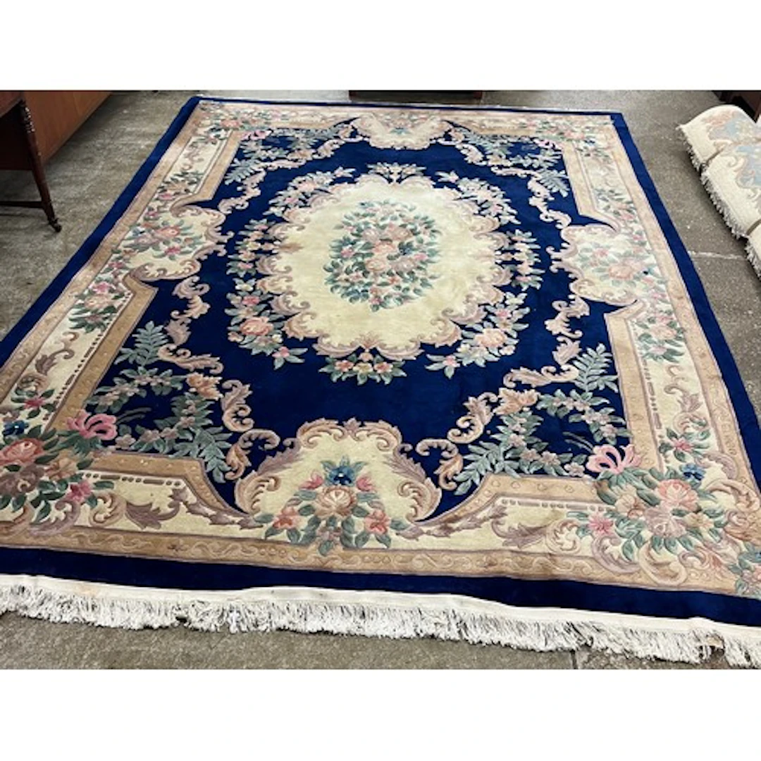 Large Chinese floral embossed rug, 382cm L x 275cm.