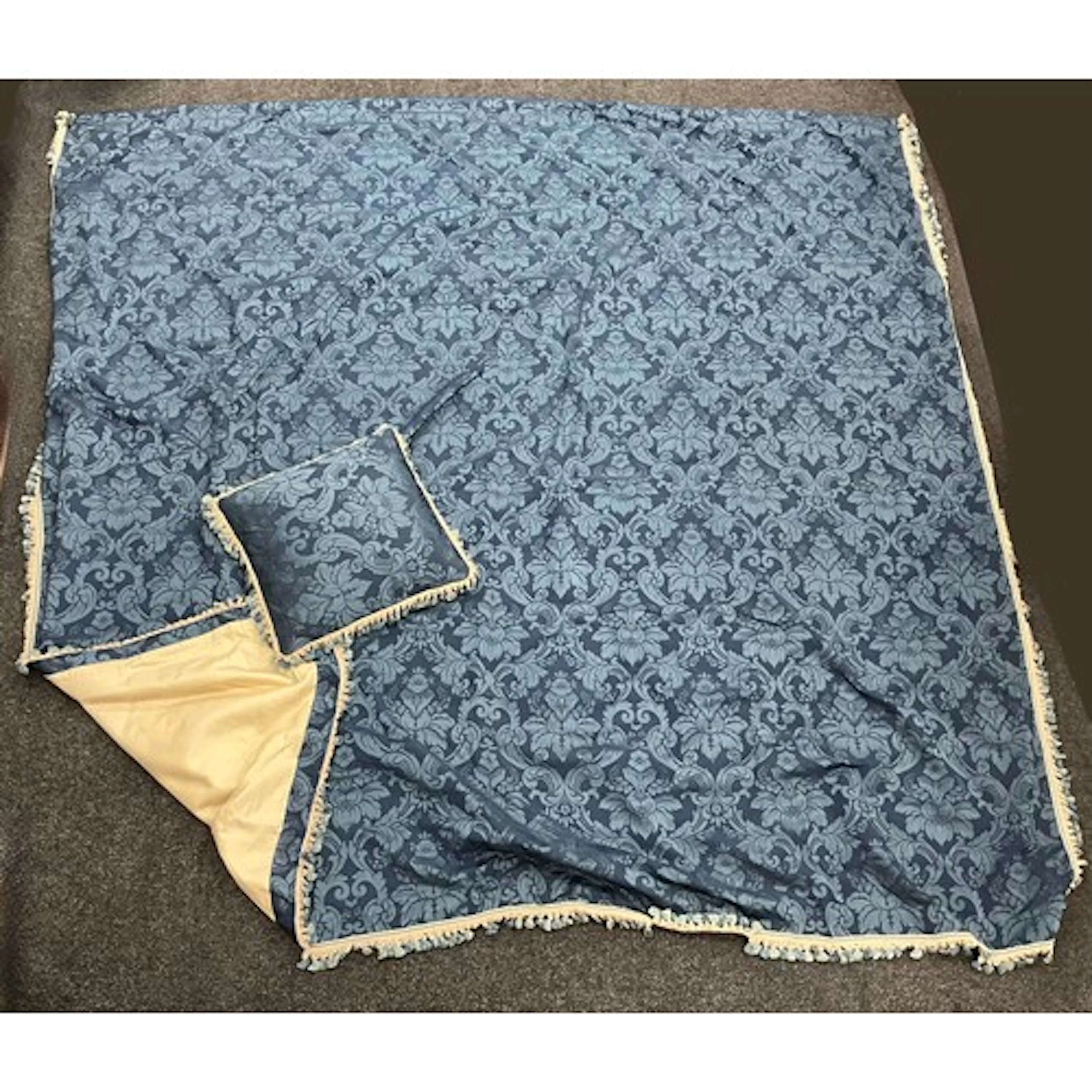 A large double size damask blue bedspread or counterpane, wi...
