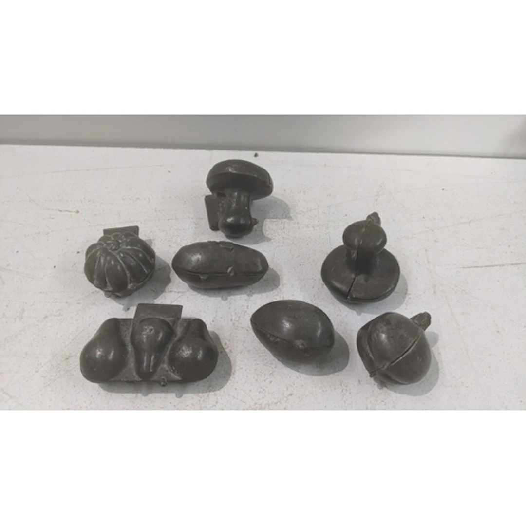 A collection of vintage pewter ice cream moulds Location: If...