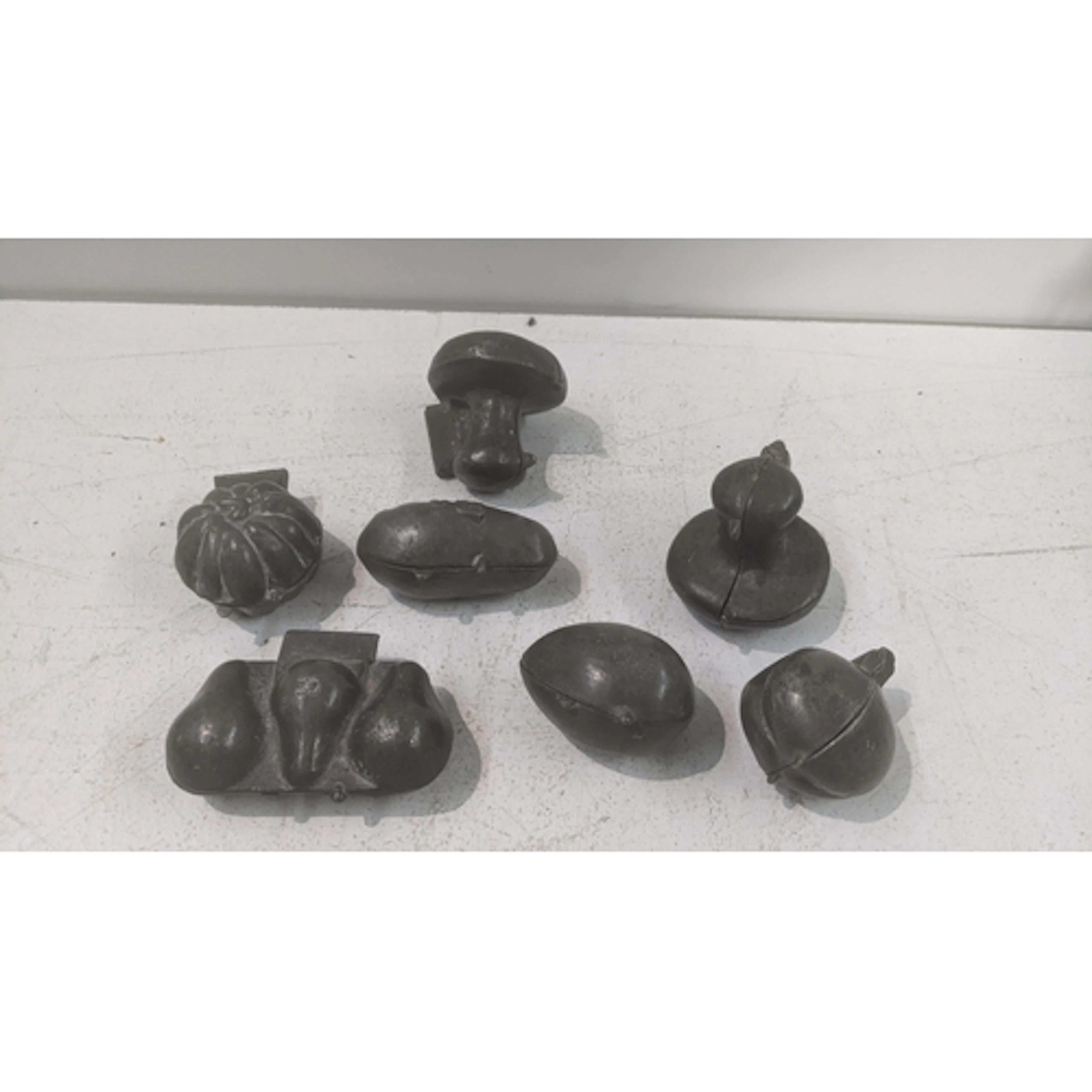 A collection of vintage pewter ice cream moulds Location: If...