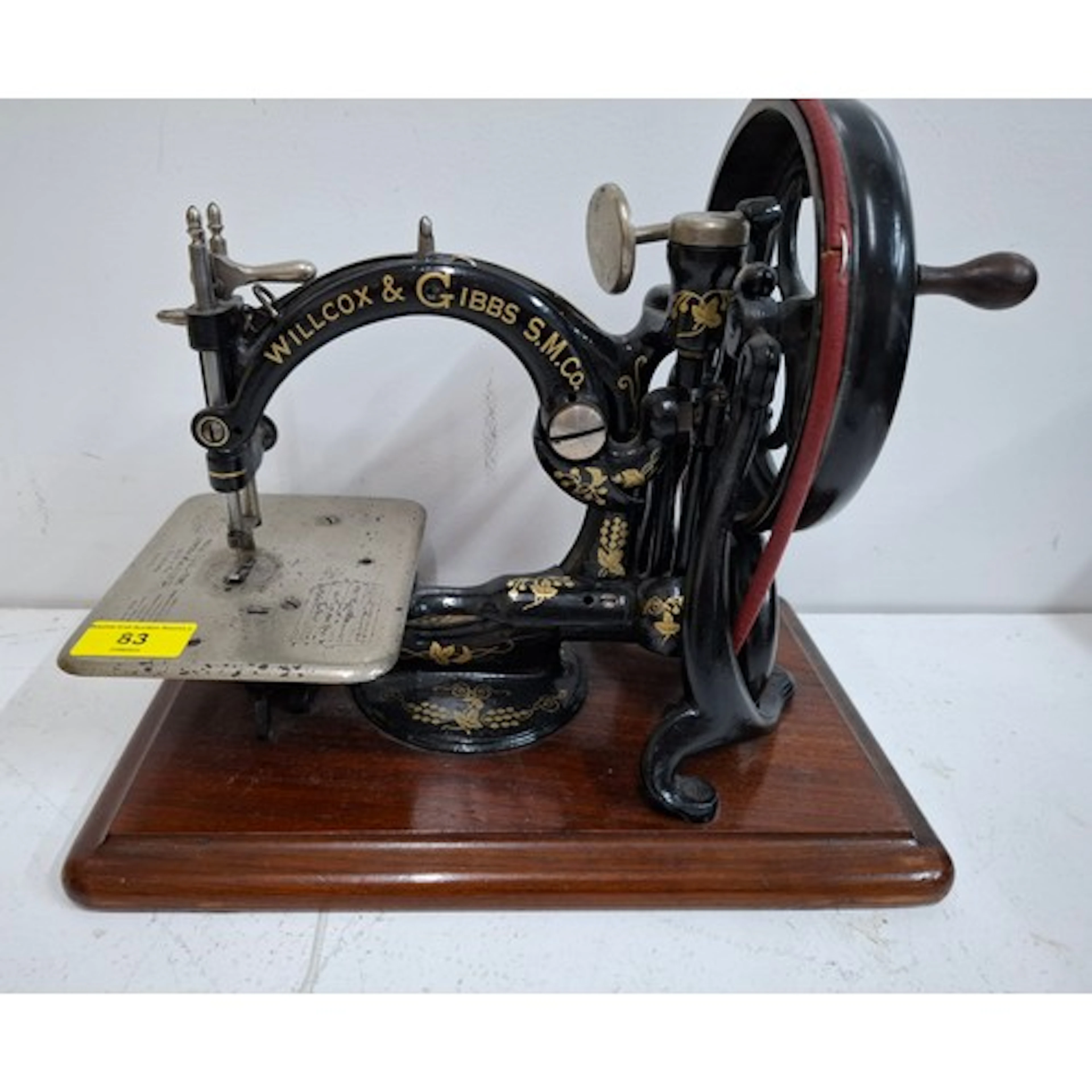 A Victorian Willcox & Gibbs S.M Co hand cranked sewing machi...
