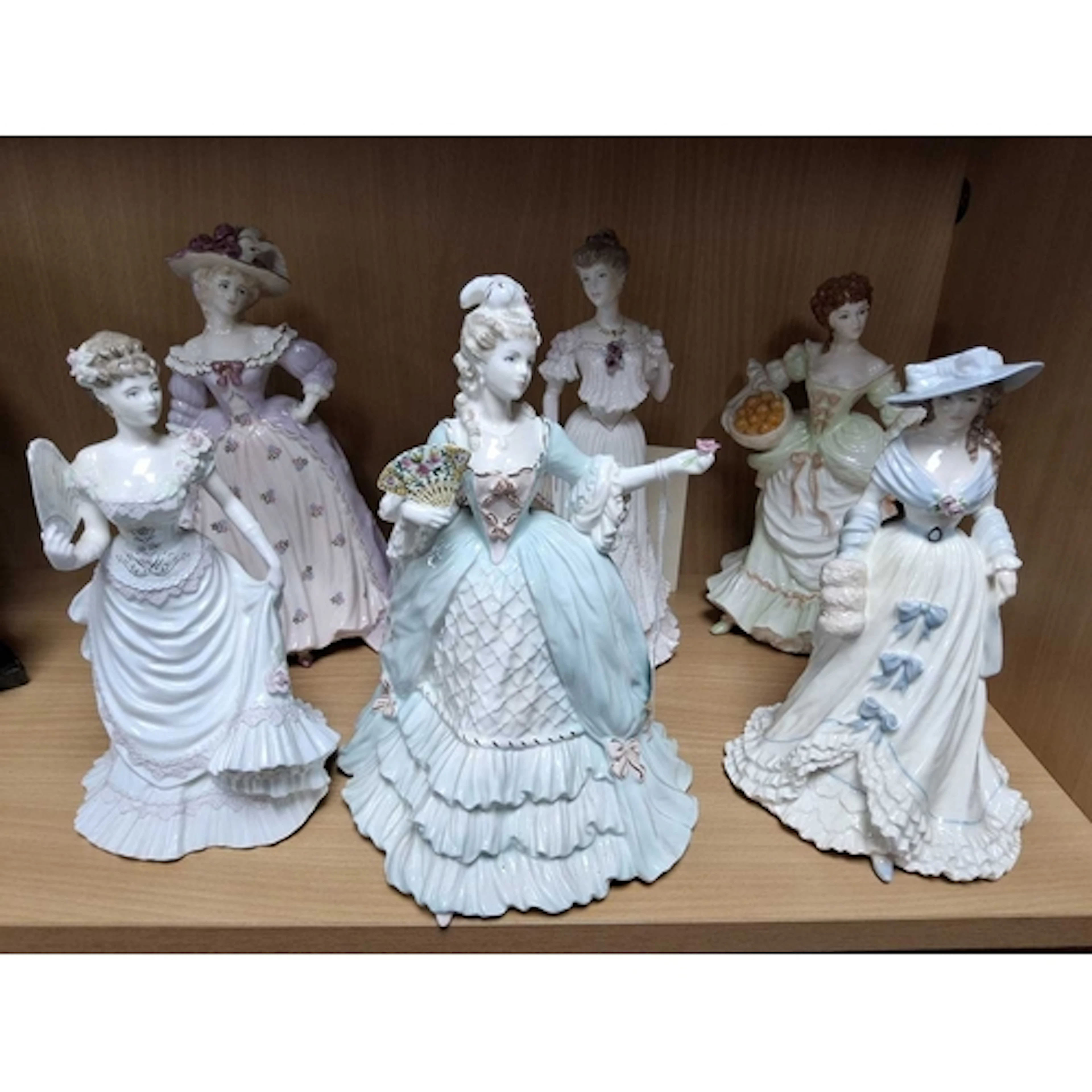 SIX COALPORT FIGURINES, comprising five from the Femmes Fata...