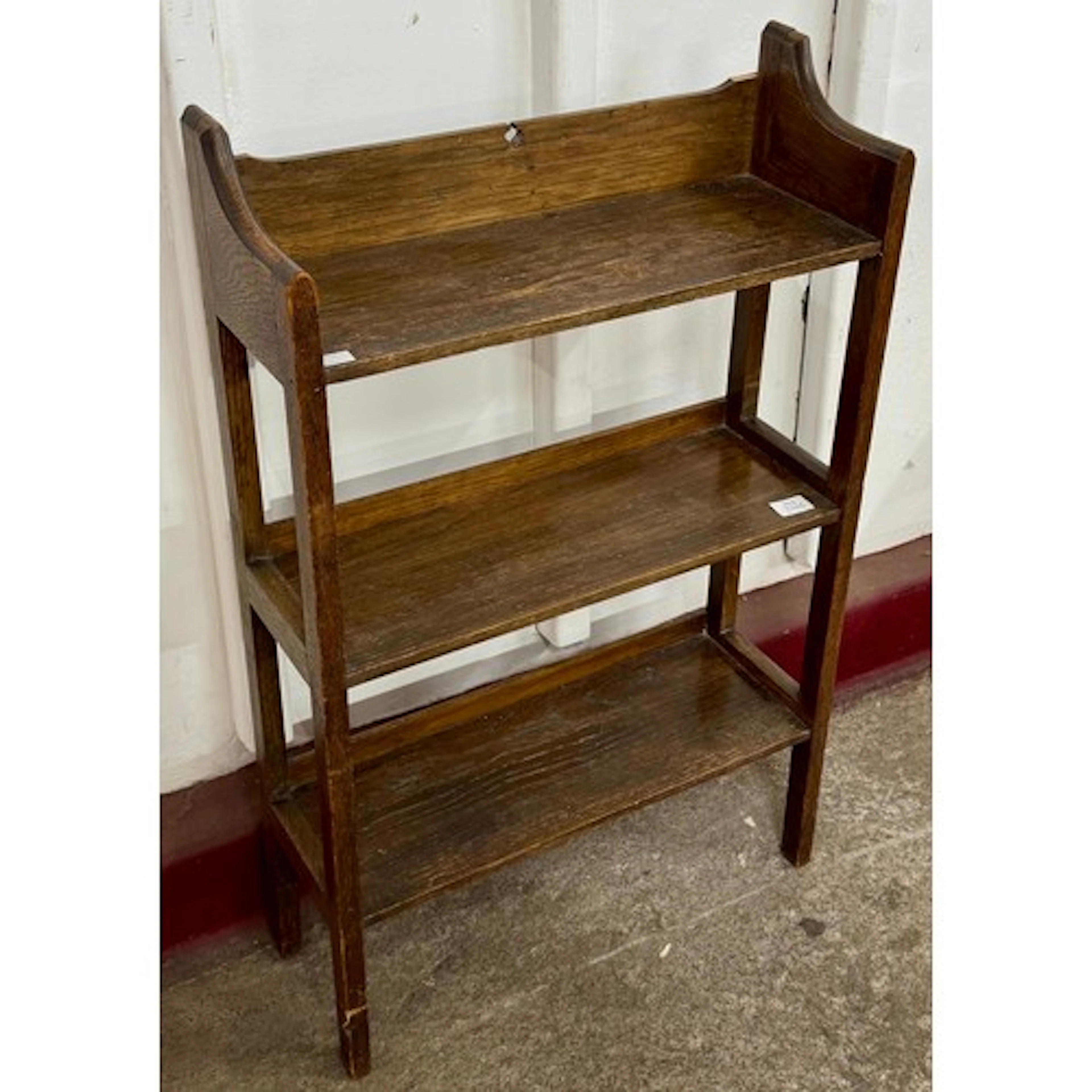 An Arts & Crafts oak open bookcase