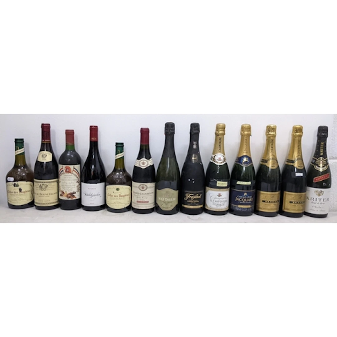 Thirteen bottles of assorted wine and sparkling wine, compri...