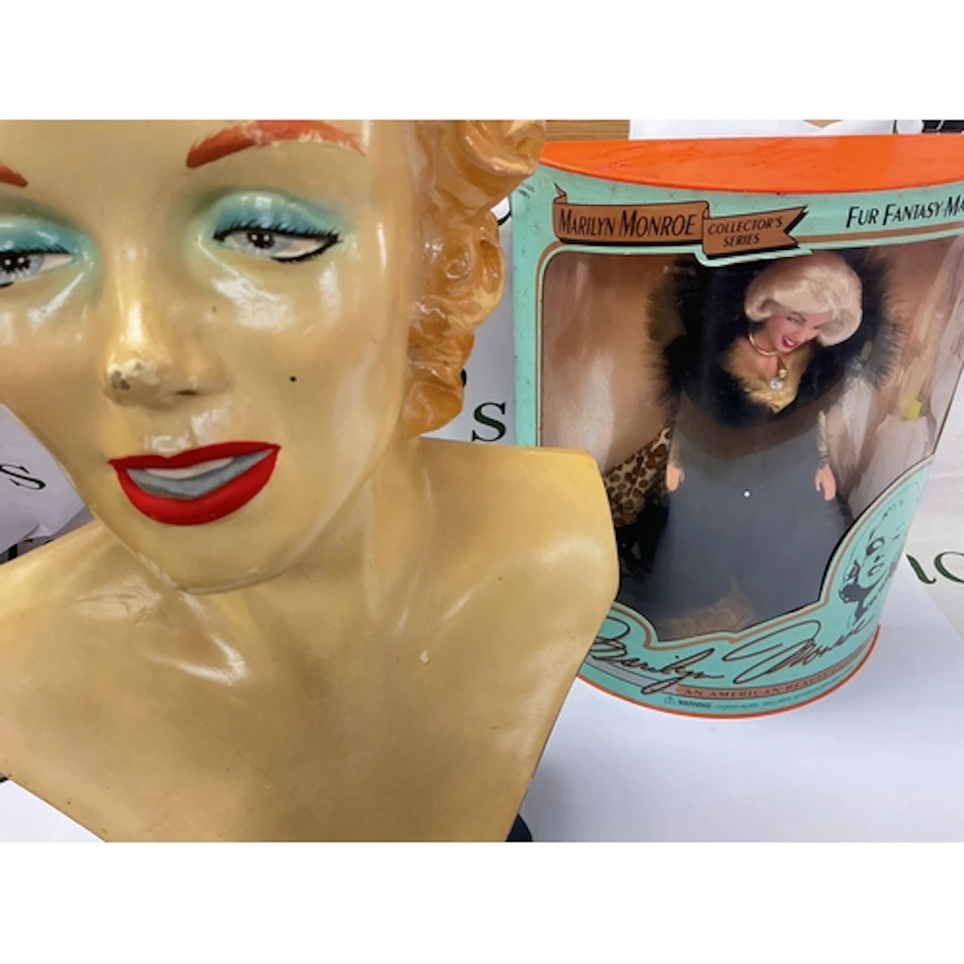 A Collection Of Marilyn Monroe Items Including A Fibreglass ...