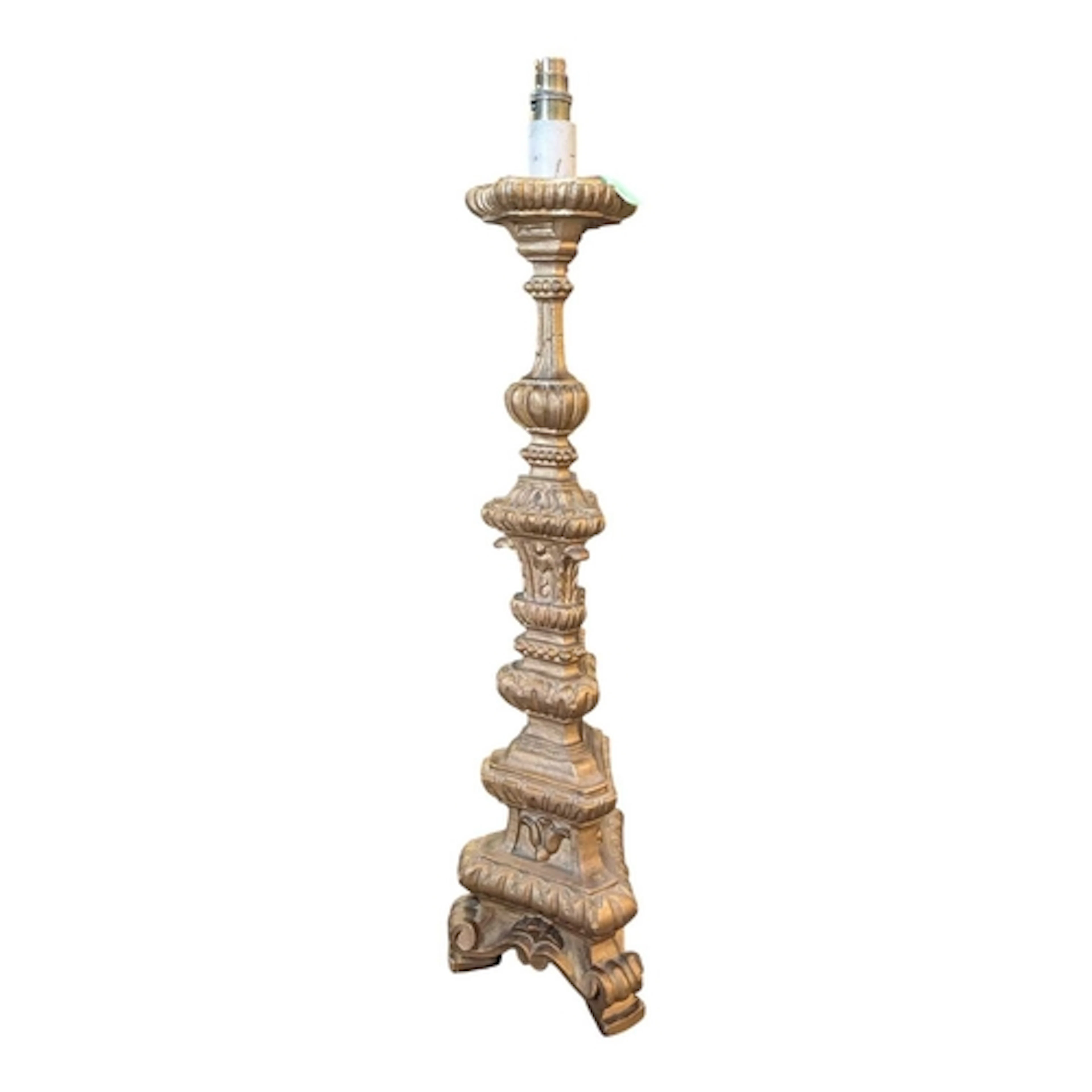 An Italian Baroque-style hardwood standard lamp, in the form...