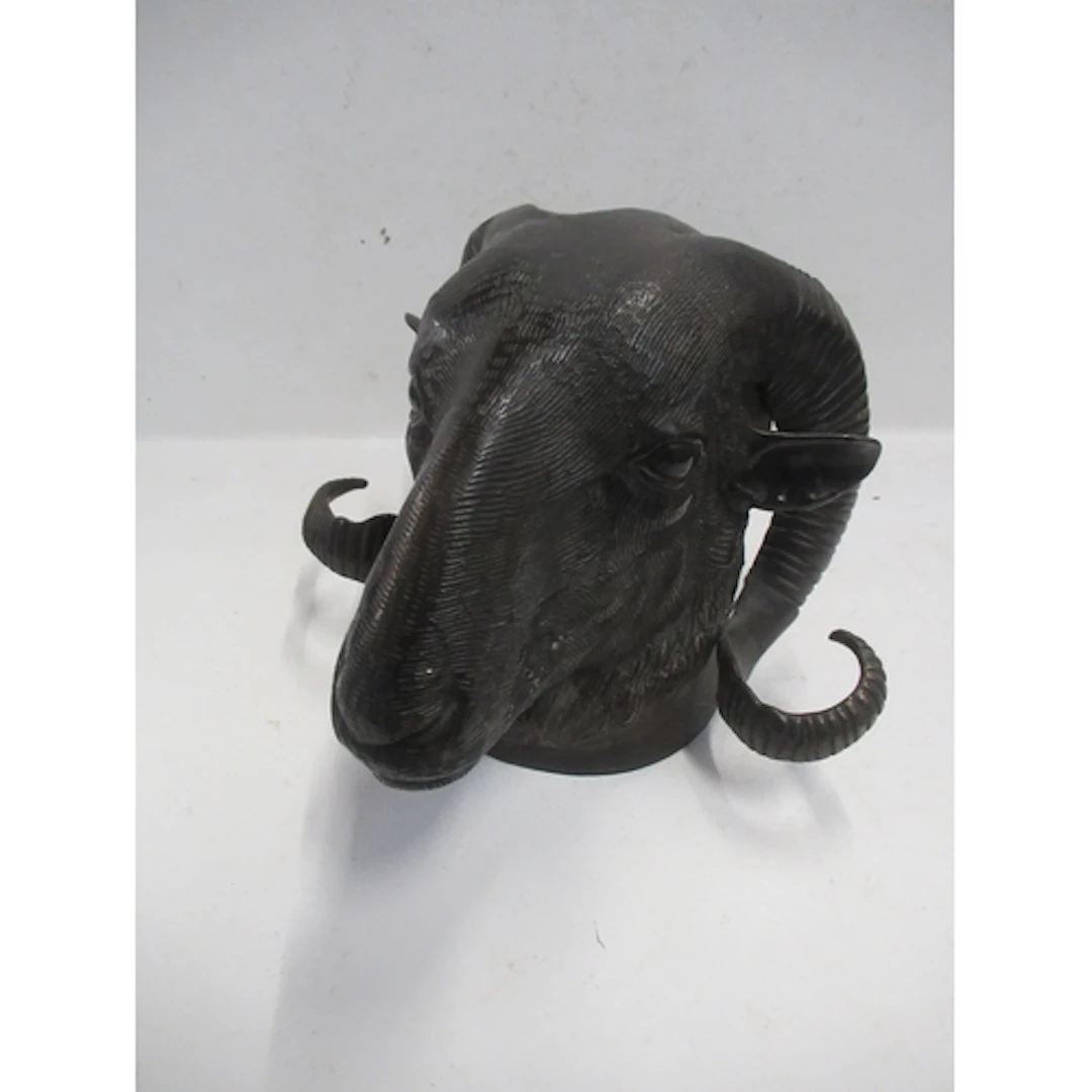 A metal model of a rams mask