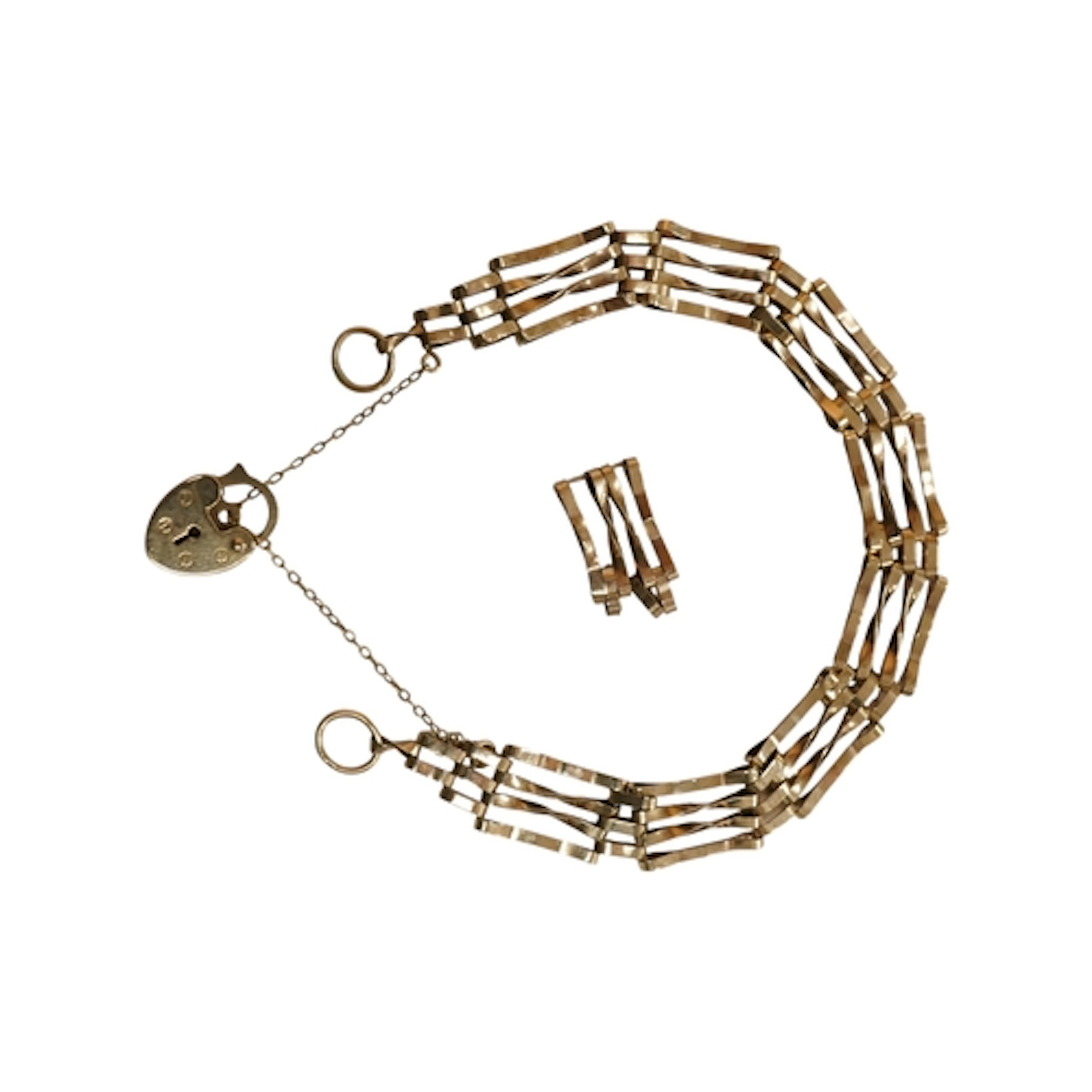 A late 20th century 9ct gold gate link bracelet, with spare ...