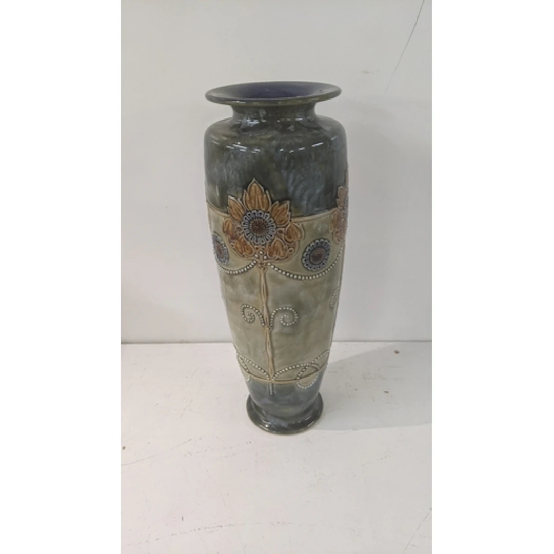 A Royal Doulton sunflowers vase, measuring 36cm high Locatio...