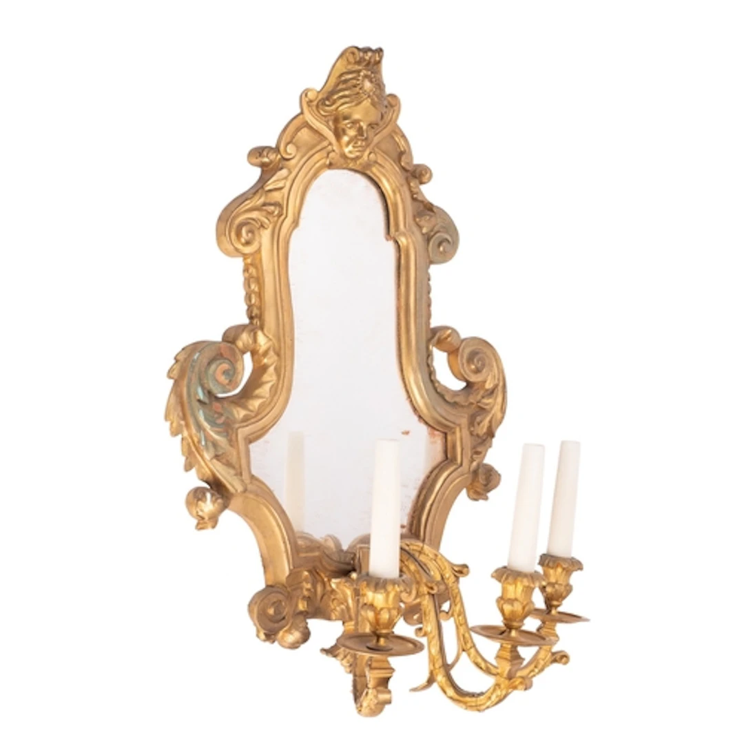 A gilt bronze framed three-light girandole in Louis XV taste...