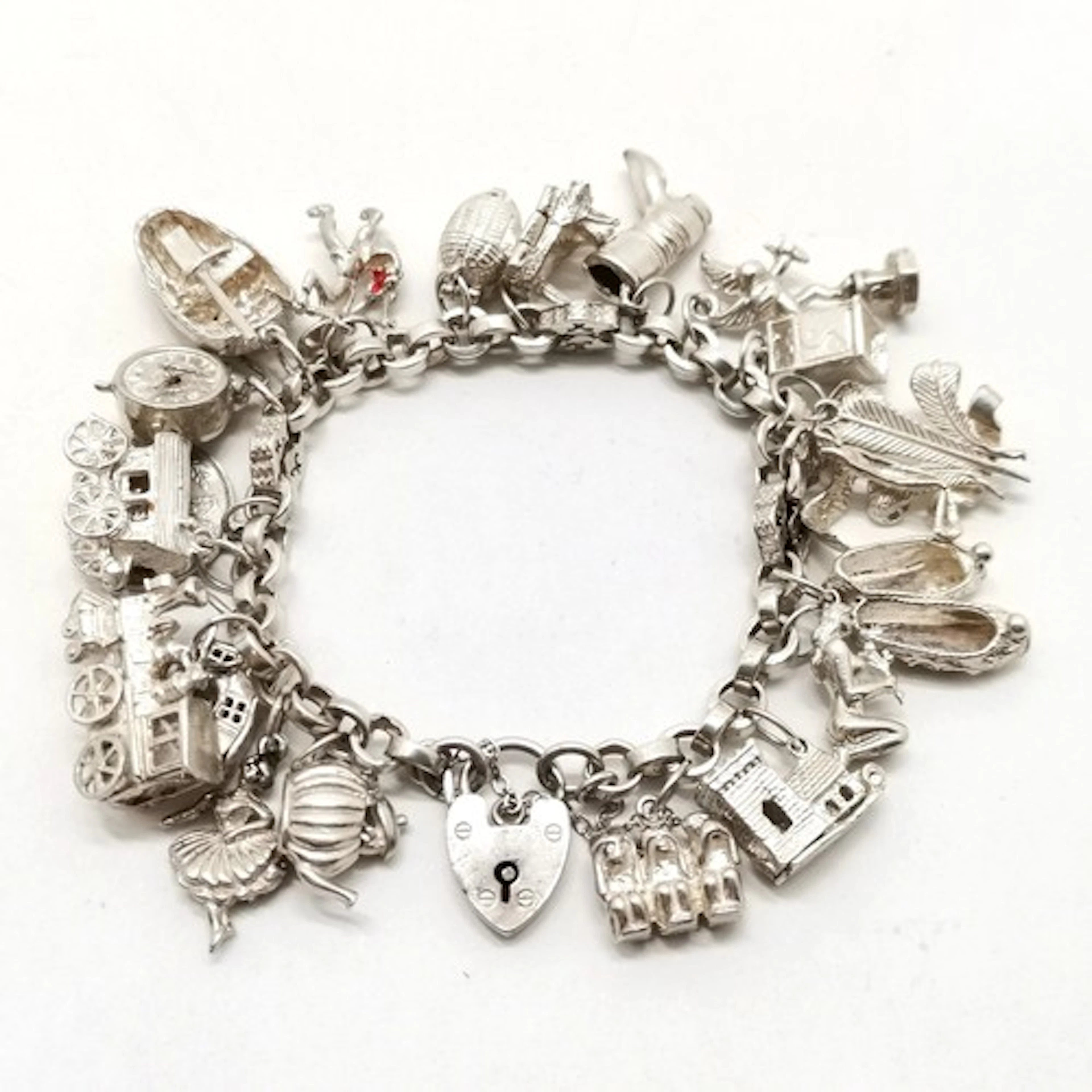 Antique silver charm bracelet with charms inc 3 wise monkeys...
