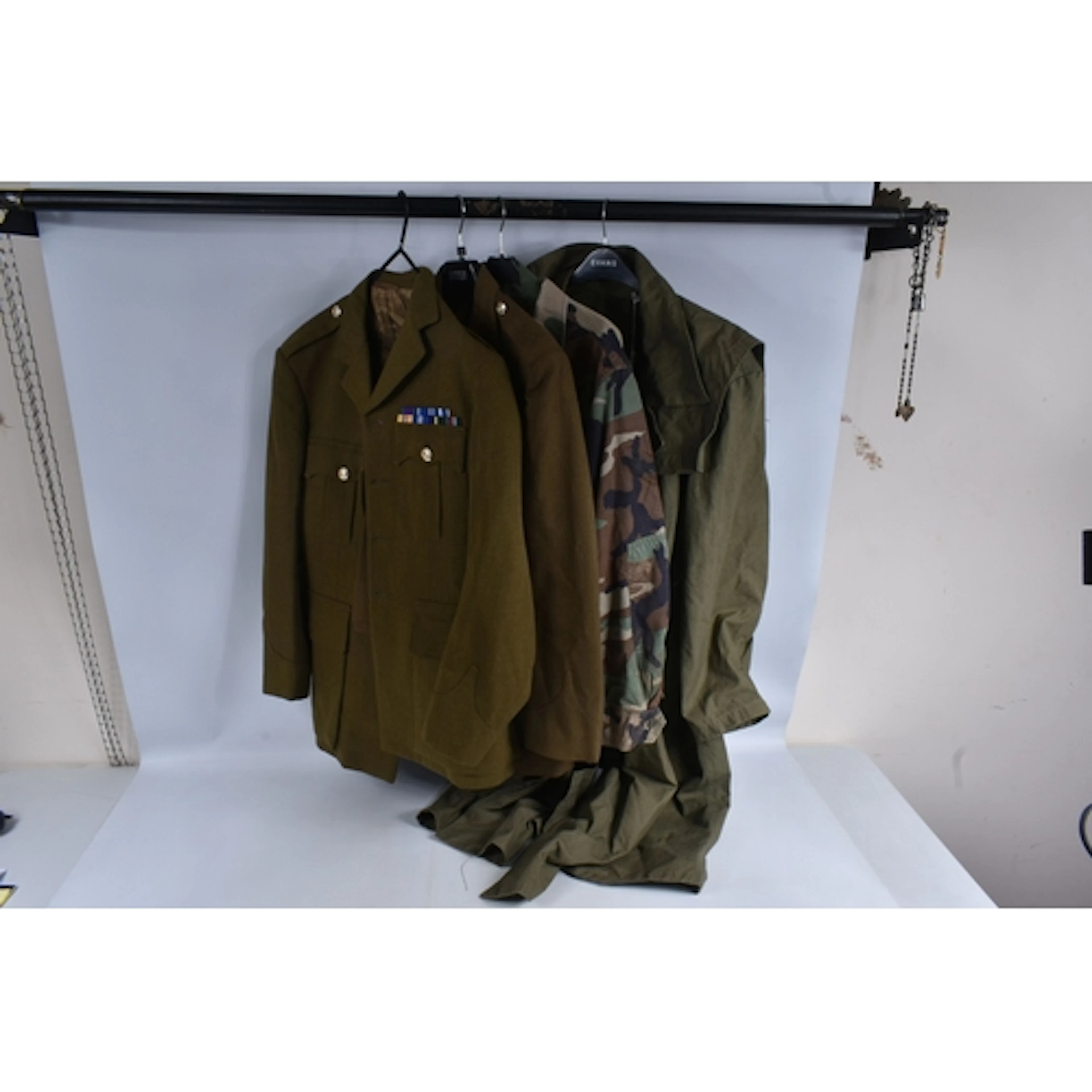 A COLLECTION OF BRITISH MILITARY UNIFORMS, to include a dres...