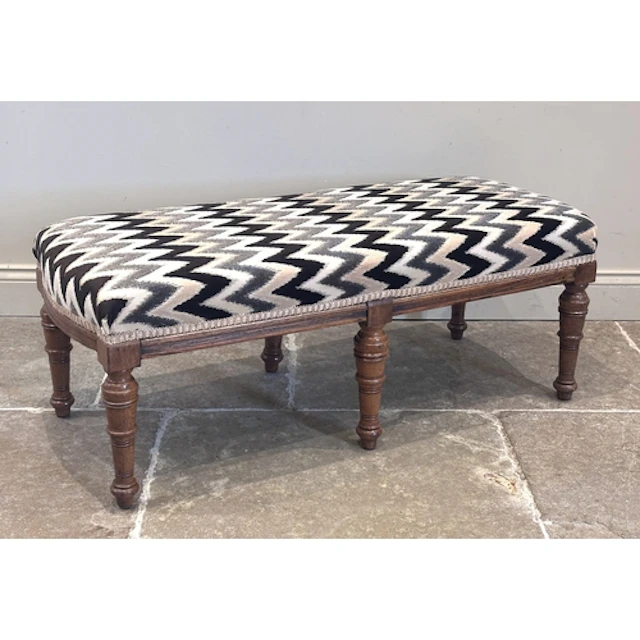 A Victorian style oak framed long stool, later upholstered, ...