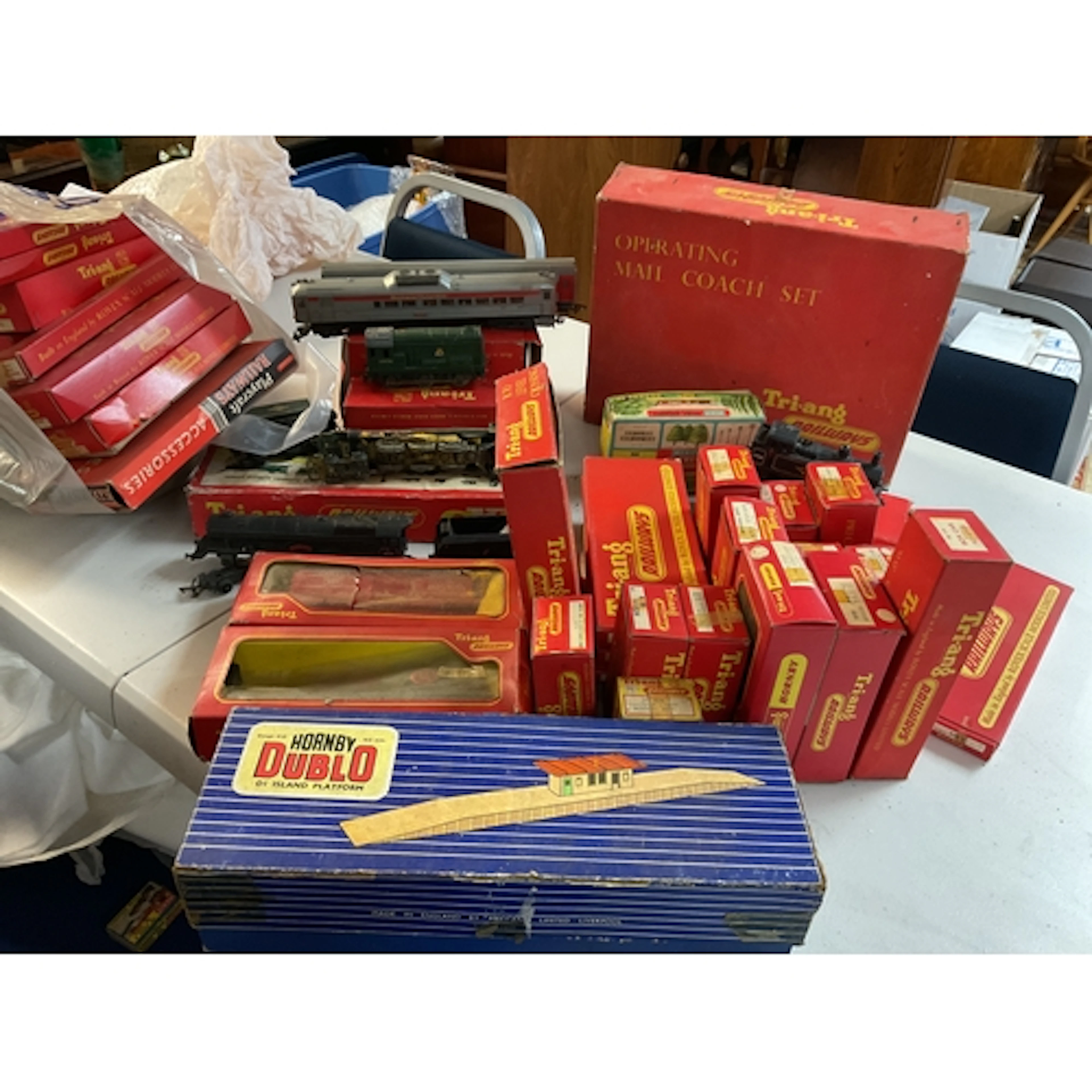 Large qty boxed Triangle trains, track, rolling stock and bu...