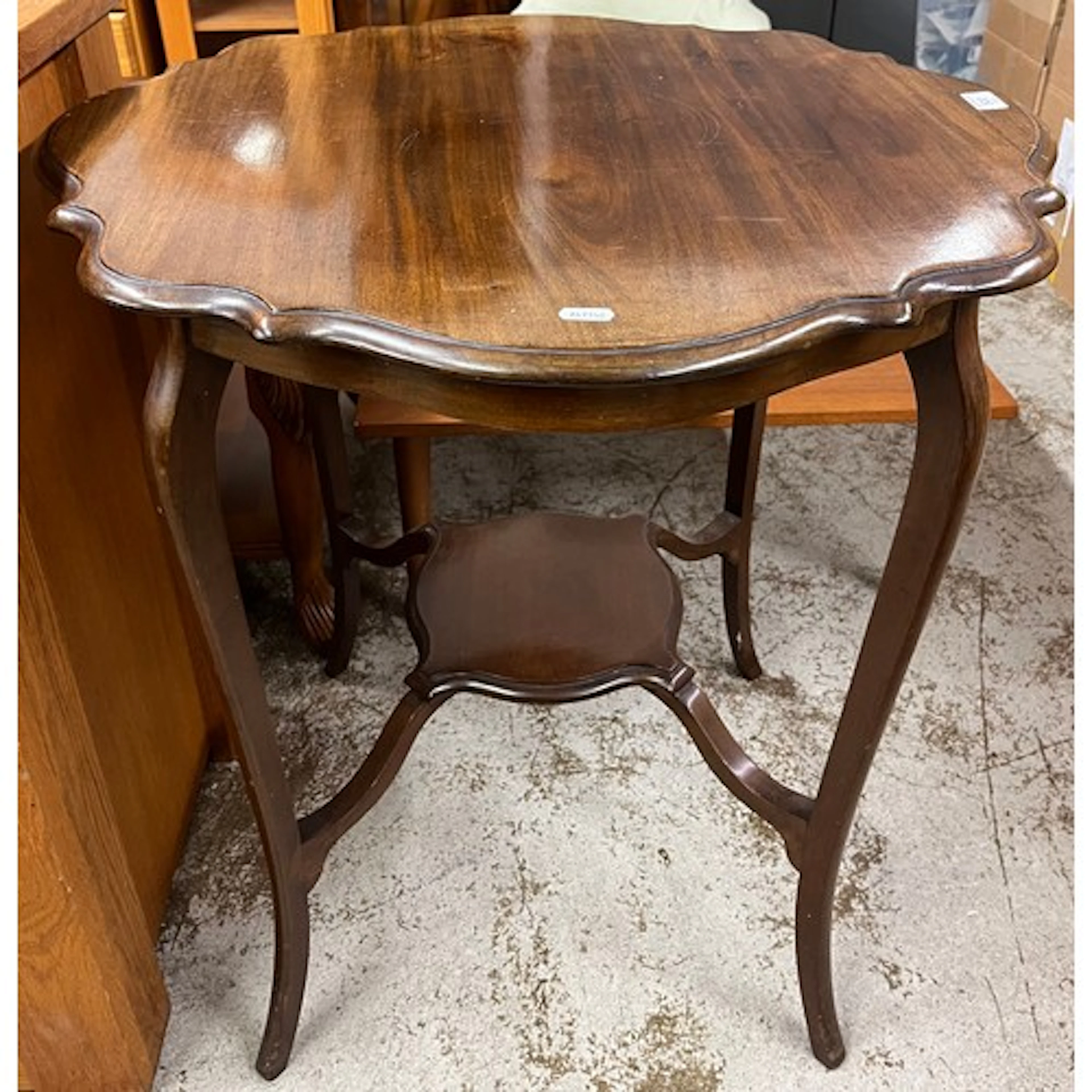 Edwardian circular two-tier window tables, 67cm diameter.