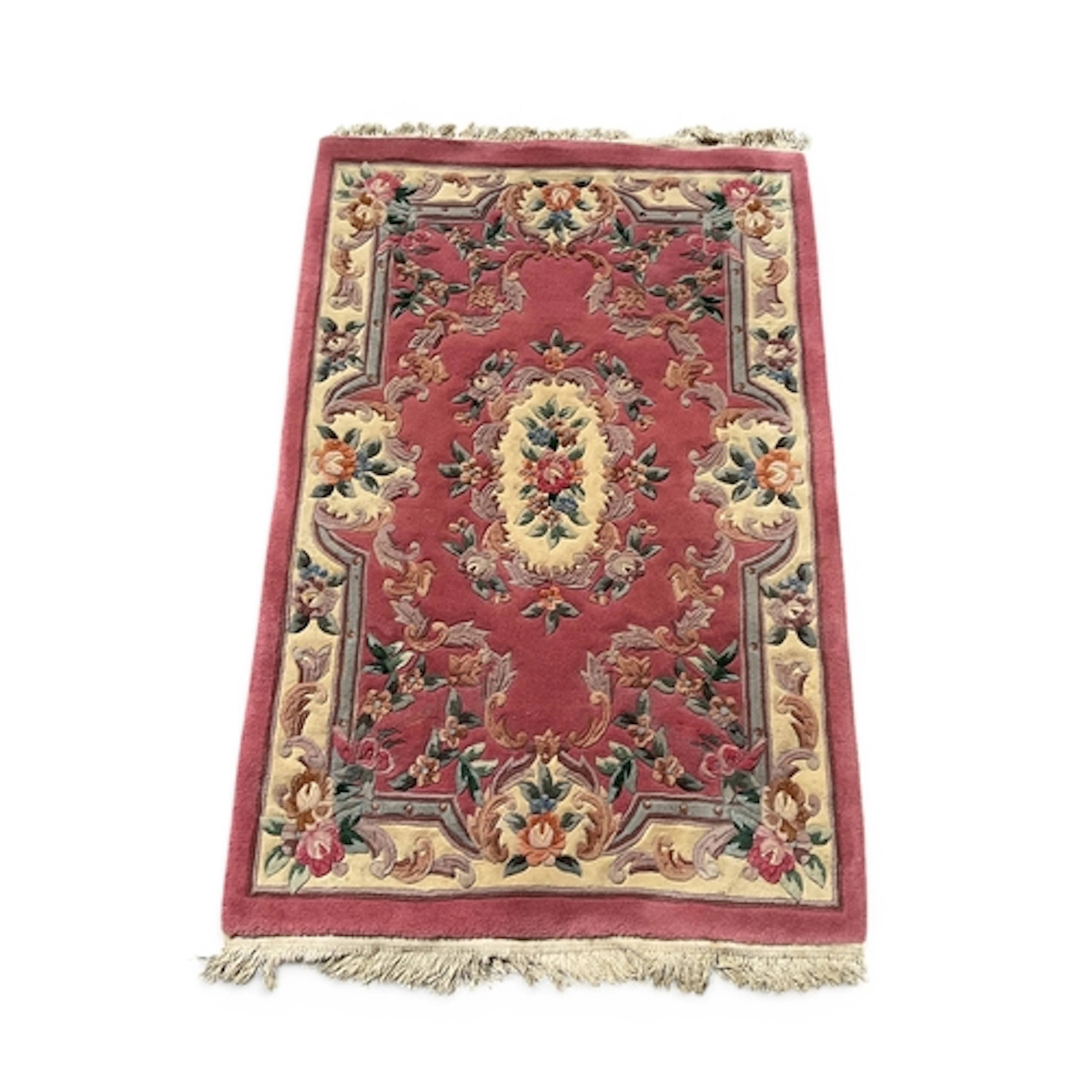 A Chinese wool hearth rug, decorated with an Aubusson-style ...
