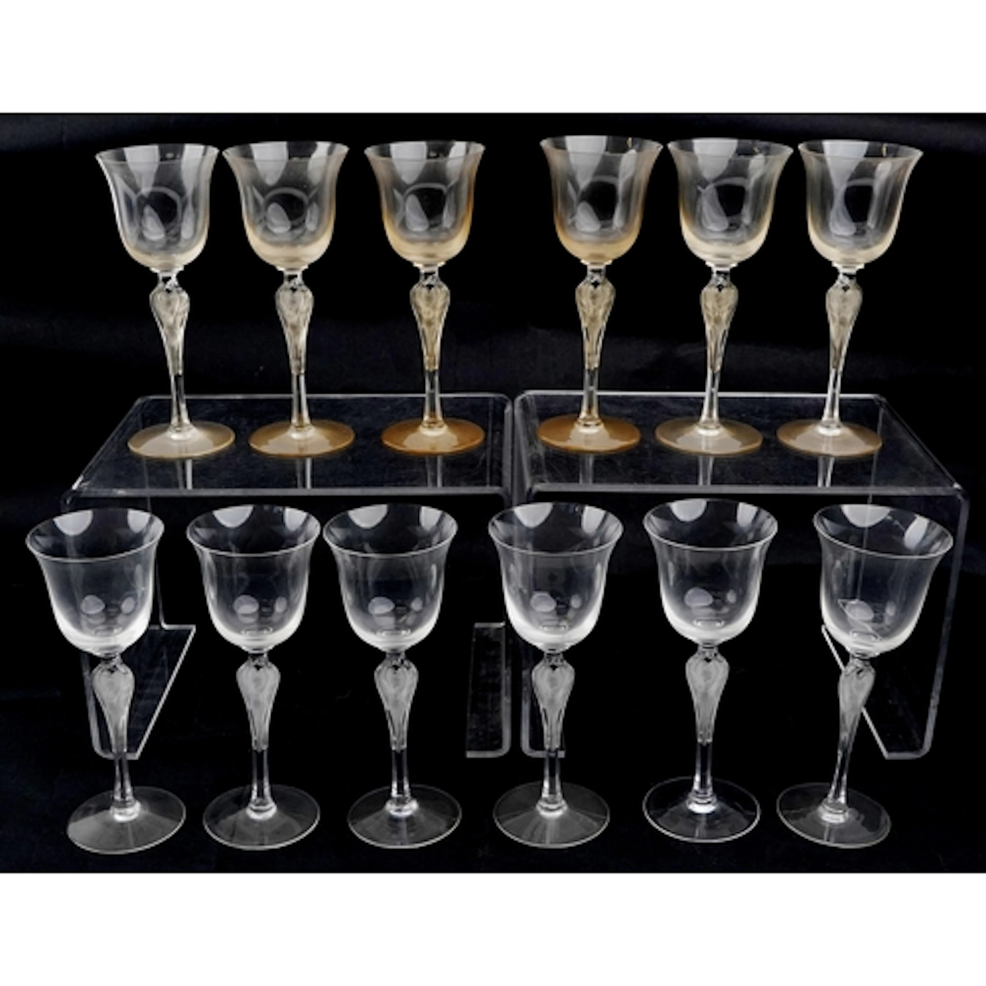 A set of twelve Igor Carl Fabergé glasses with nude female f...