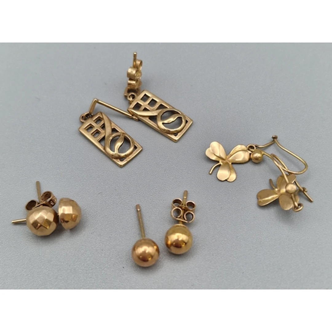 Four pairs of 9ct gold earrings, one in the style of Charles...