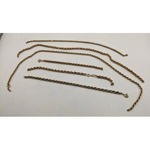 A group of six 9ct yellow gold rope twist chain necklaces an...