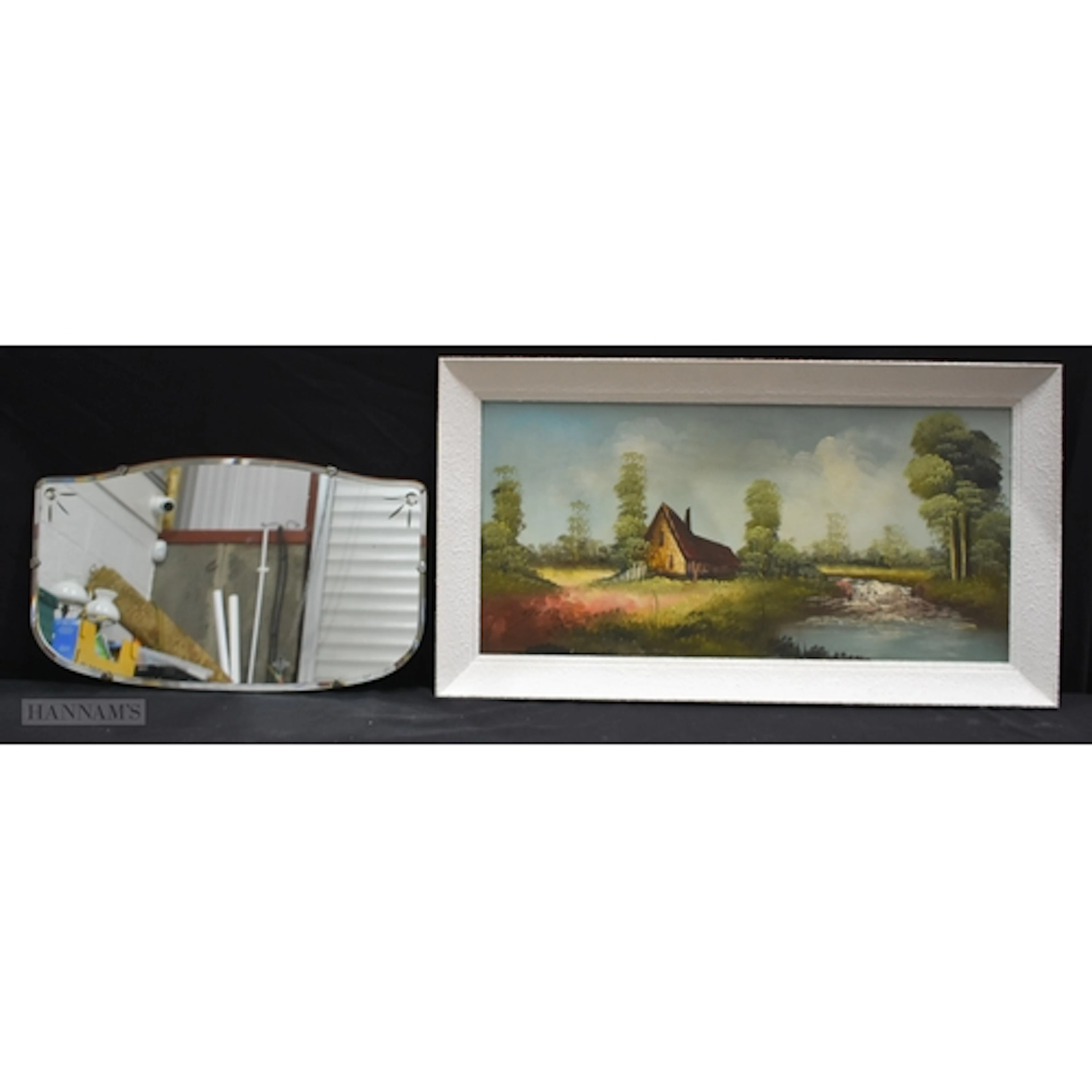 A framed 20th Century oil on canvas of a riverside farmhouse...