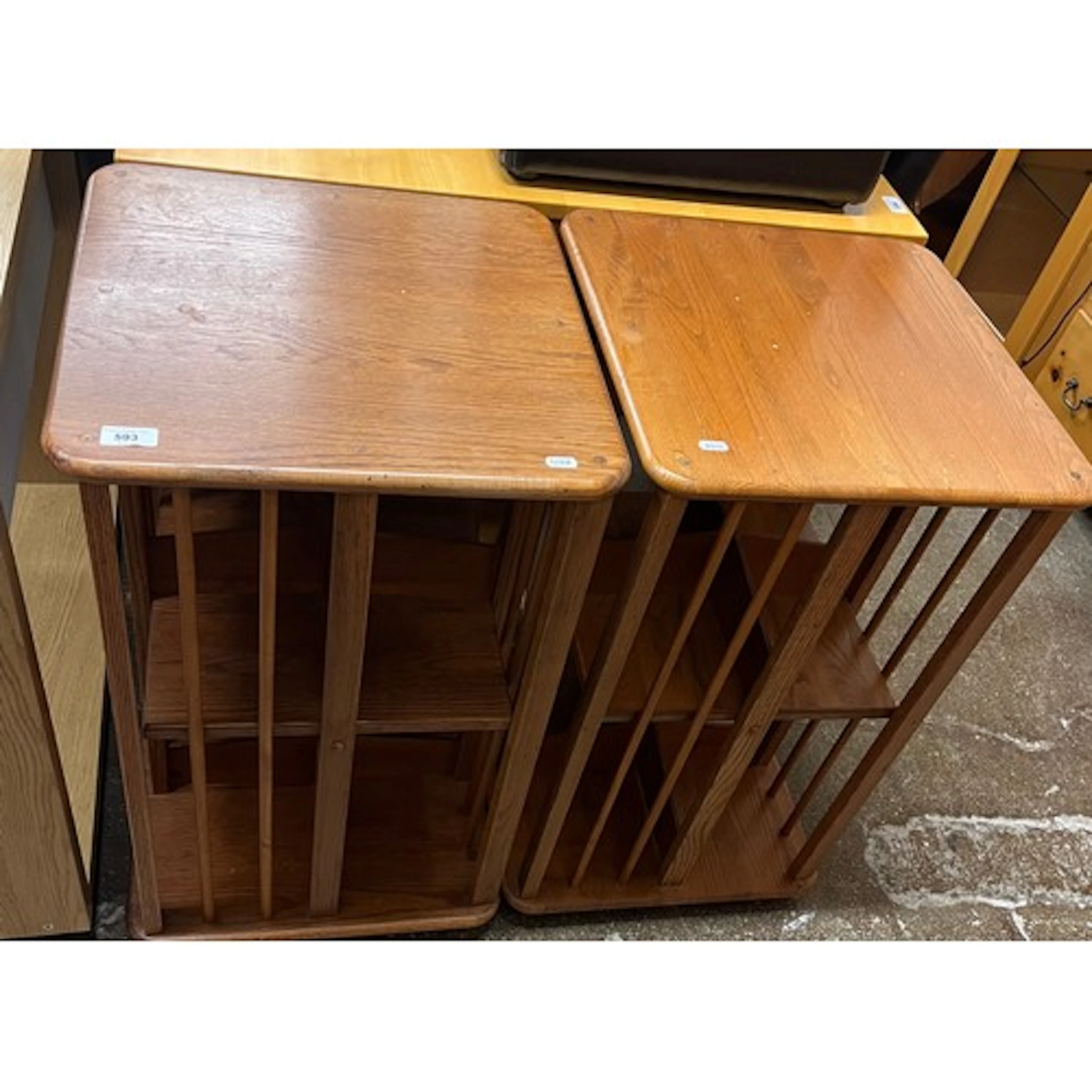 Pair of oak revolving bookcases.