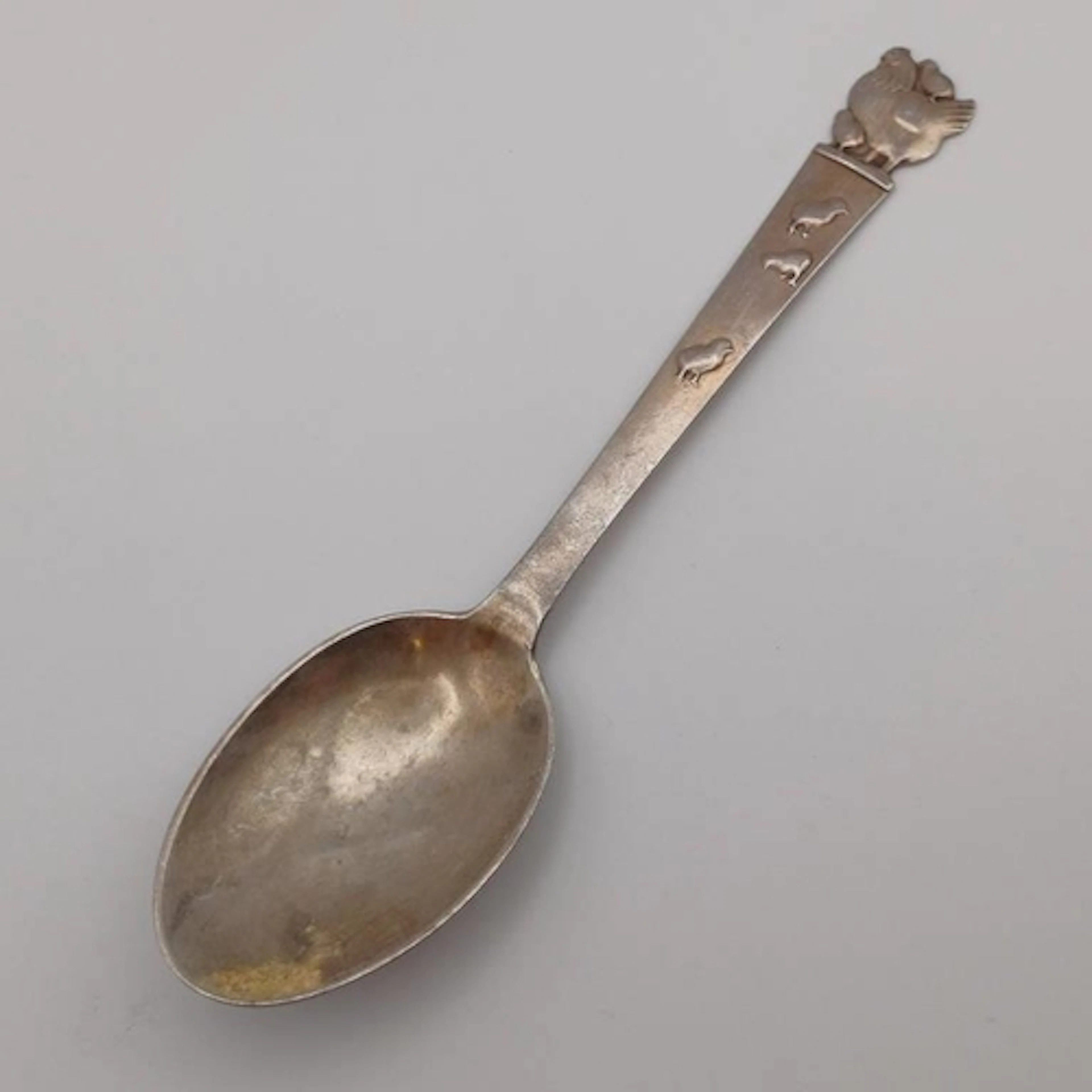 A DANISH SILVER SPOON WITH CHICKEN & CHICK DECORATION BY JOH...
