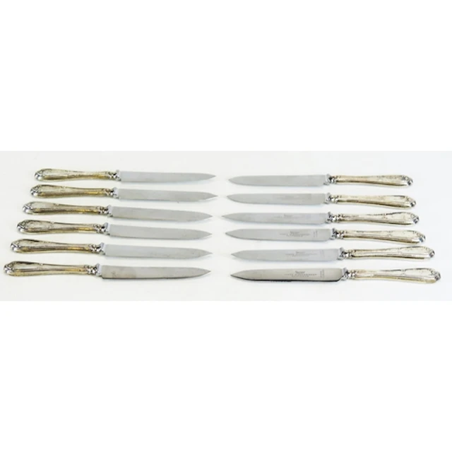 A set of twelve George V silver handled fruit knives, maker ...
